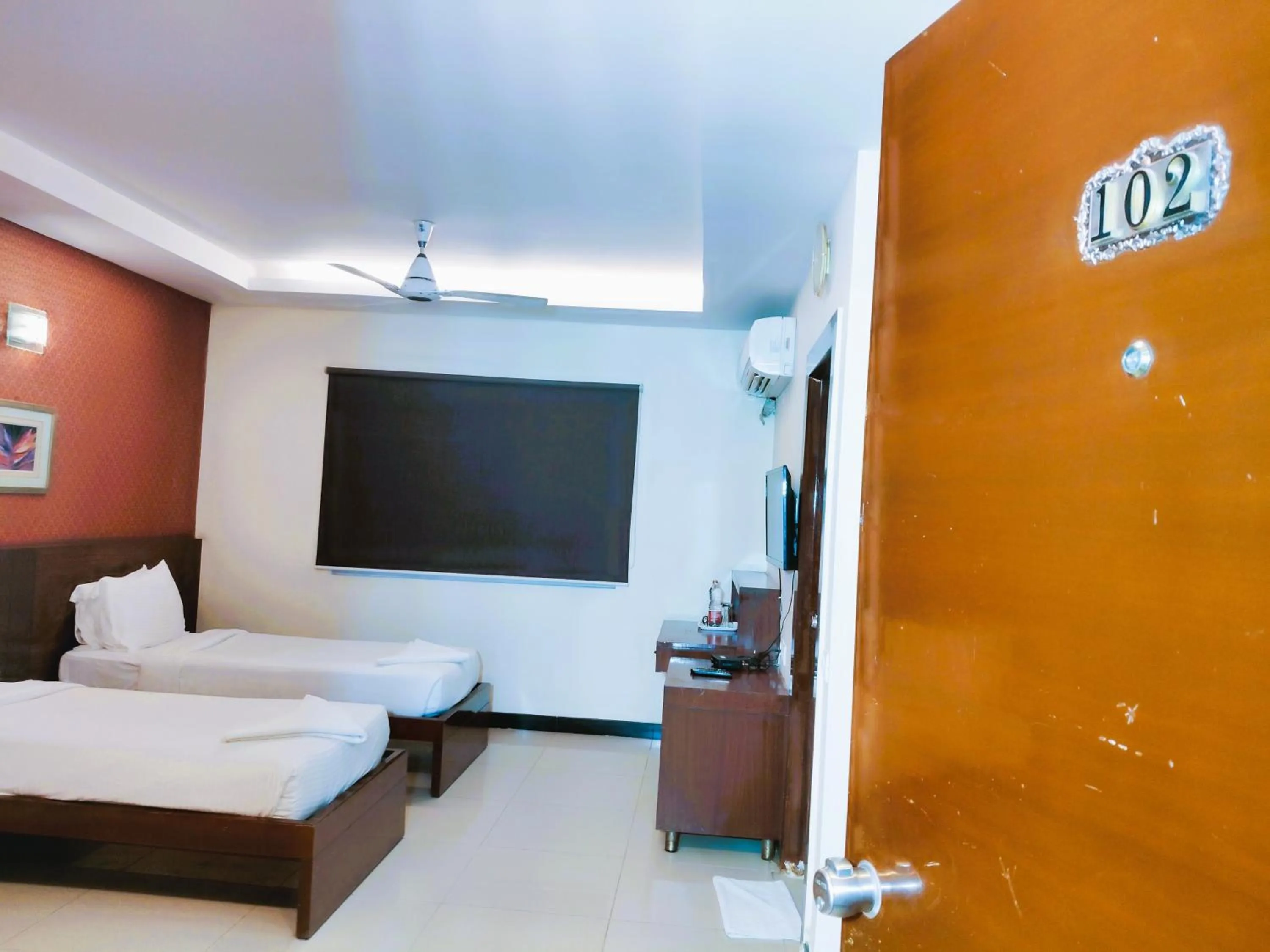 Bed in Athasri Hotel Infantry Road