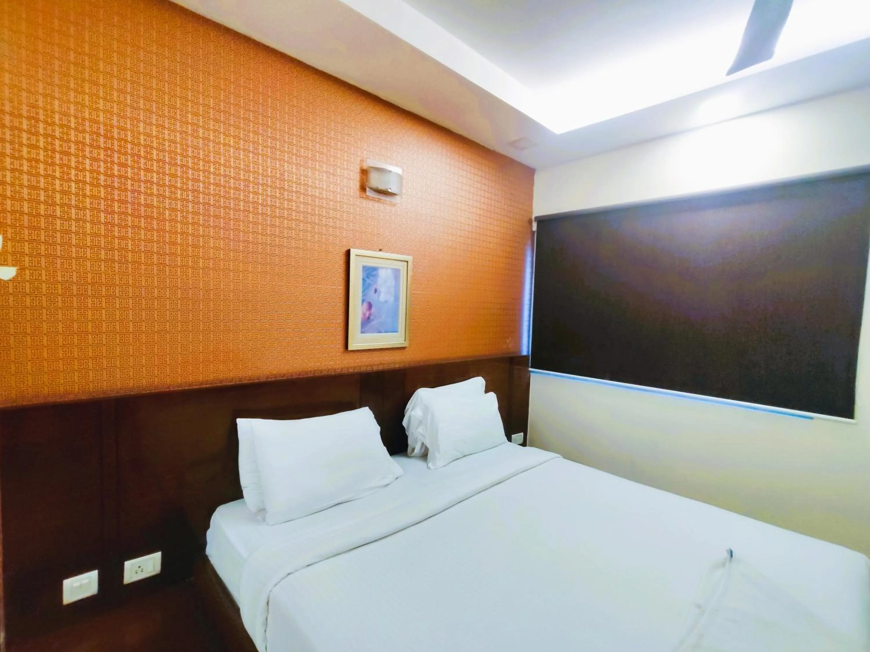 Bed in Athasri Hotel Infantry Road