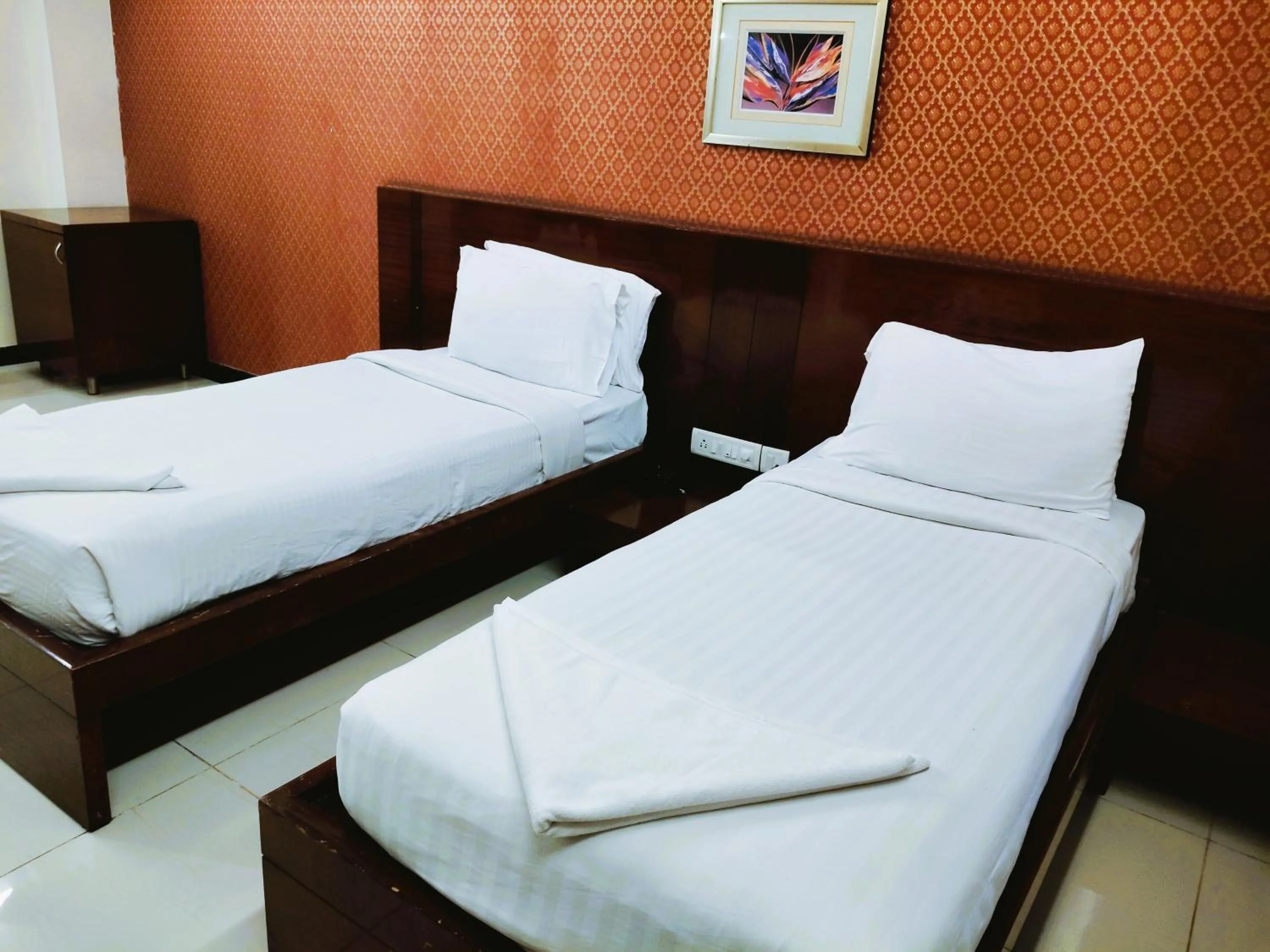 Bed in Athasri Hotel Infantry Road