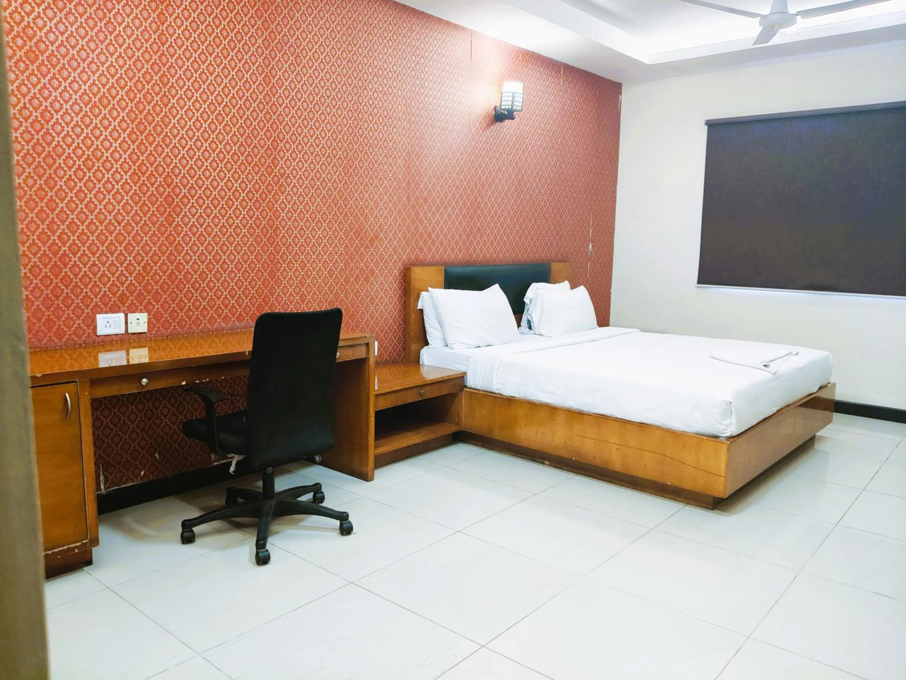 Bed in Athasri Hotel Infantry Road