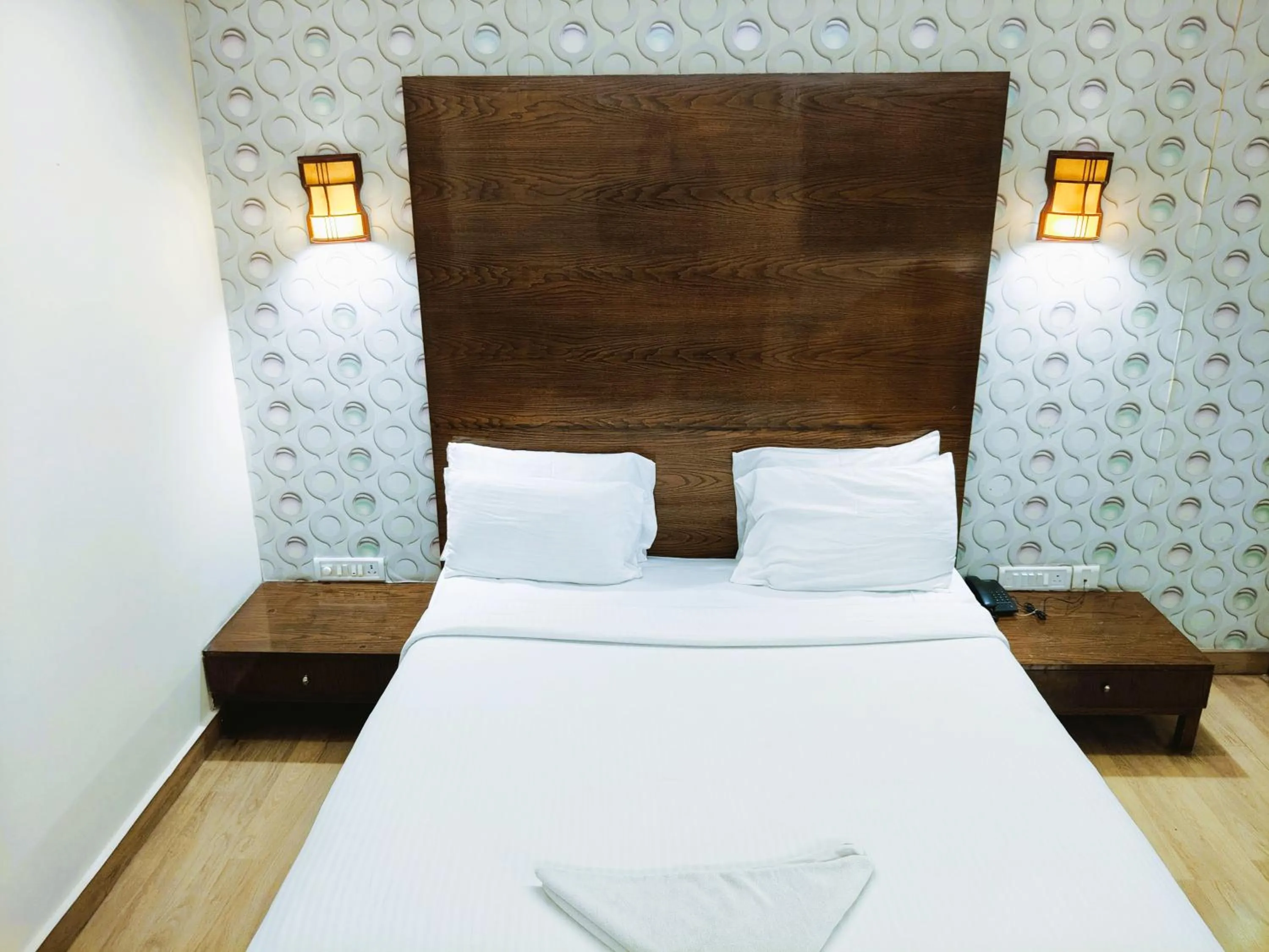 Bed in Athasri Hotel Infantry Road