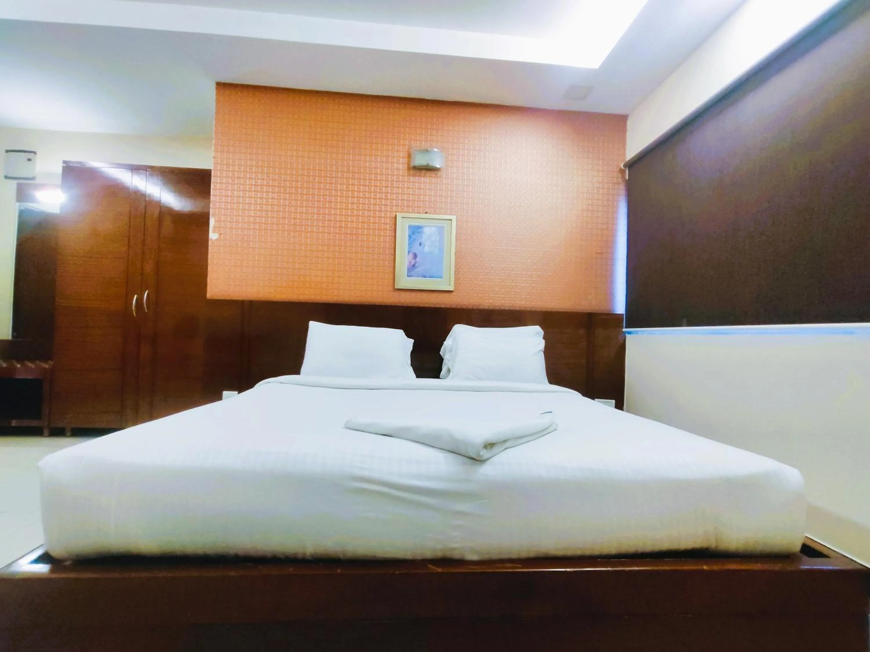 Bed in Athasri Hotel Infantry Road