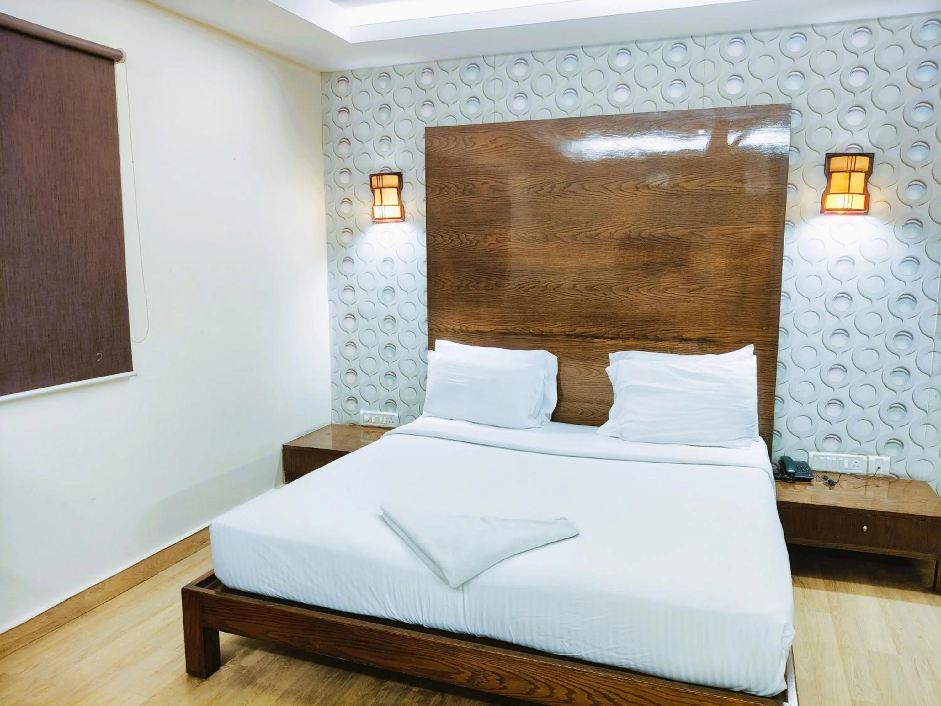 Bed in Athasri Hotel Infantry Road