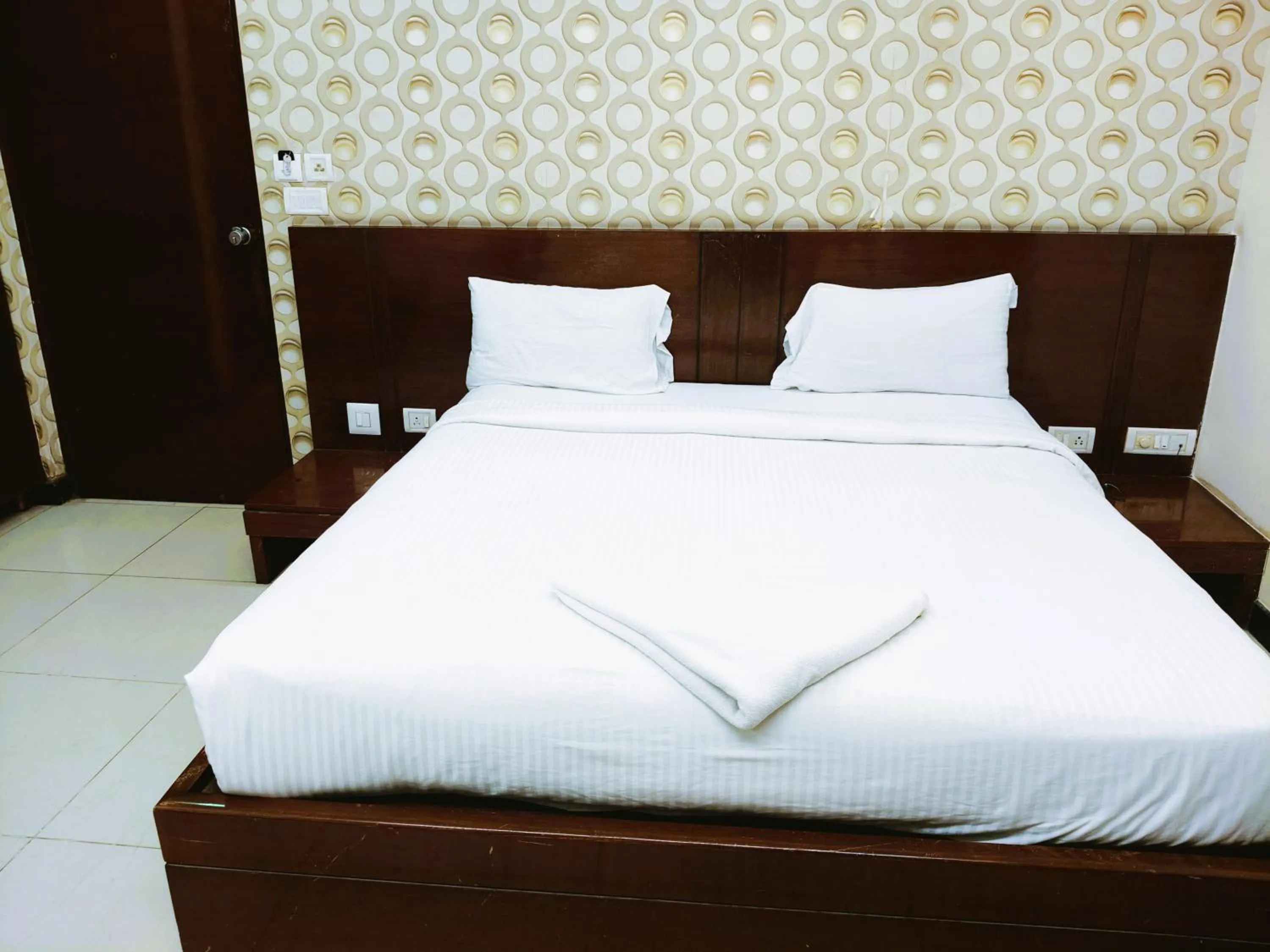 Bed in Athasri Hotel Infantry Road