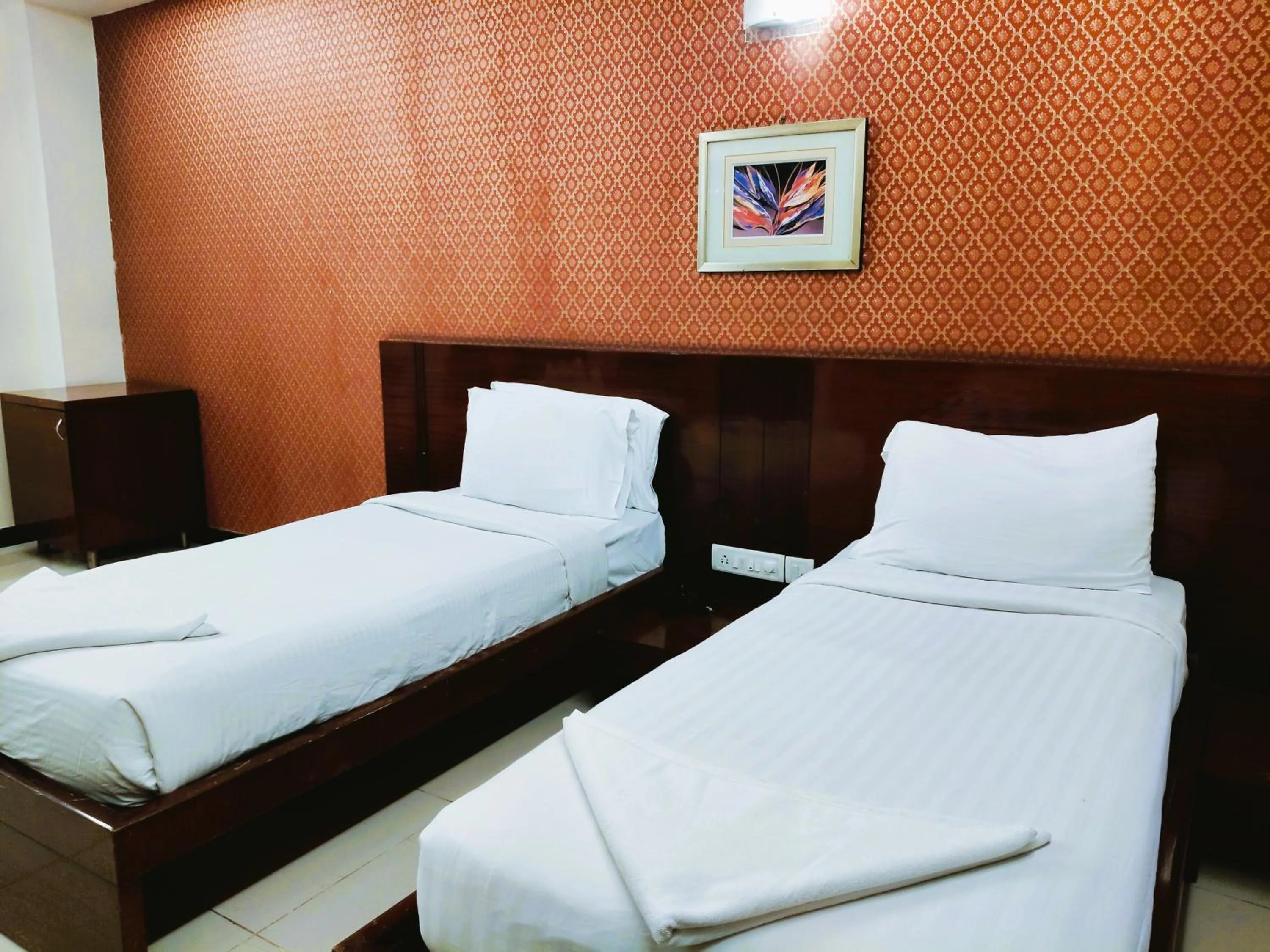 Bed in Athasri Hotel Infantry Road