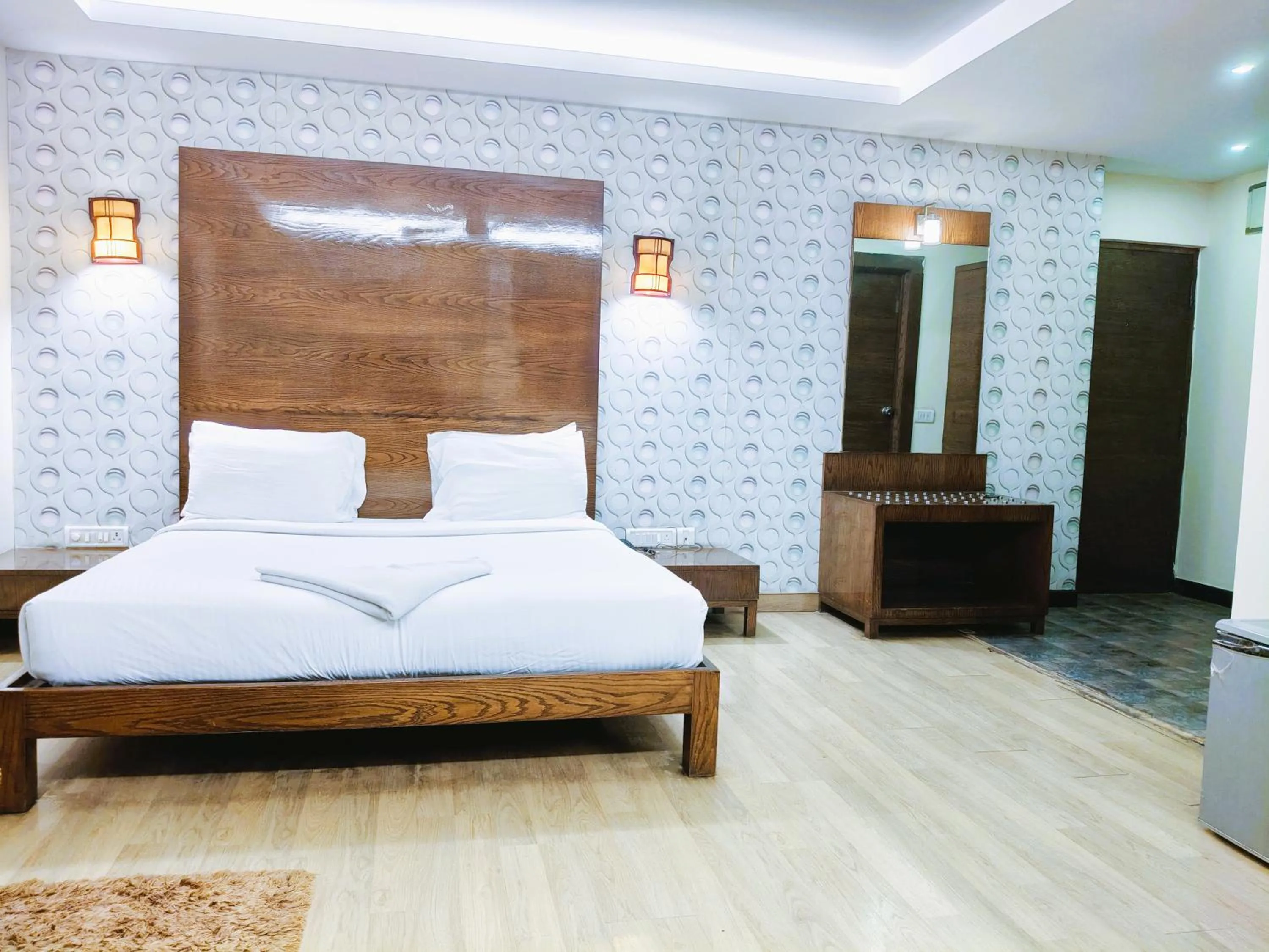 Bed in Athasri Hotel Infantry Road