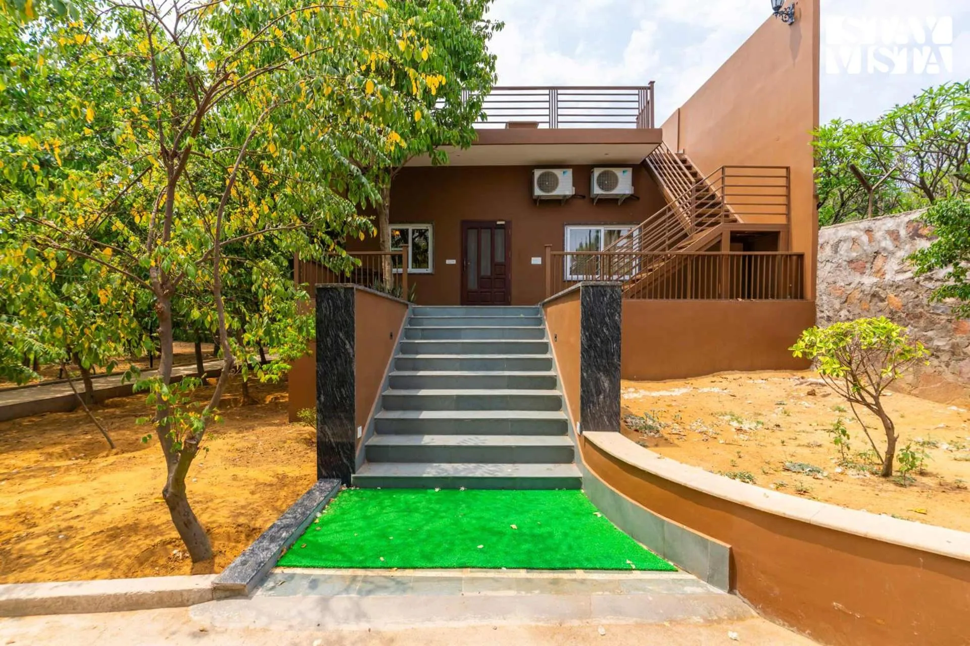 Property building in StayVista at Maple Farms with Pool, BBQ & Bonfire