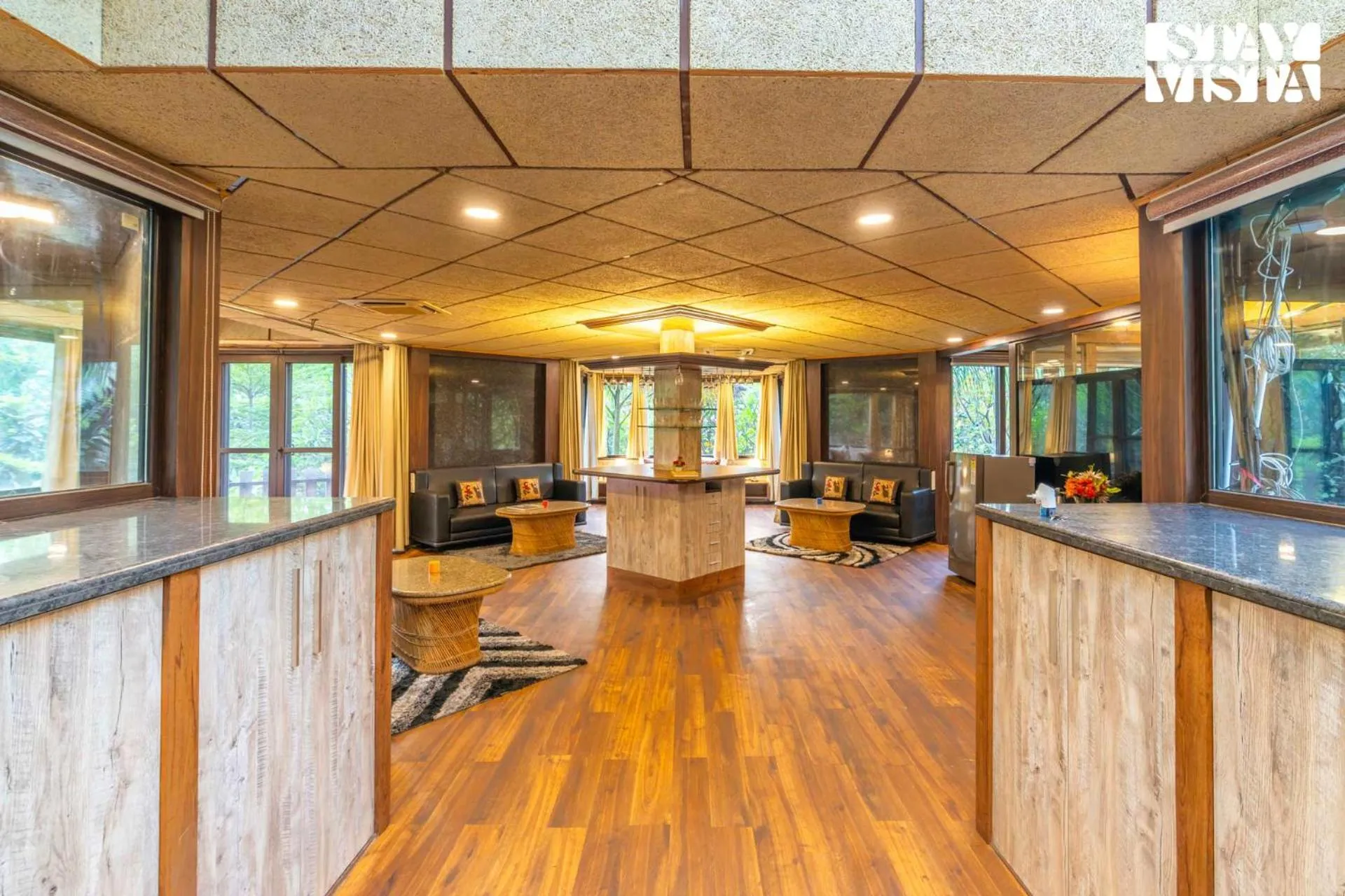 Living room in StayVista at Maple Farms with Pool, BBQ & Bonfire