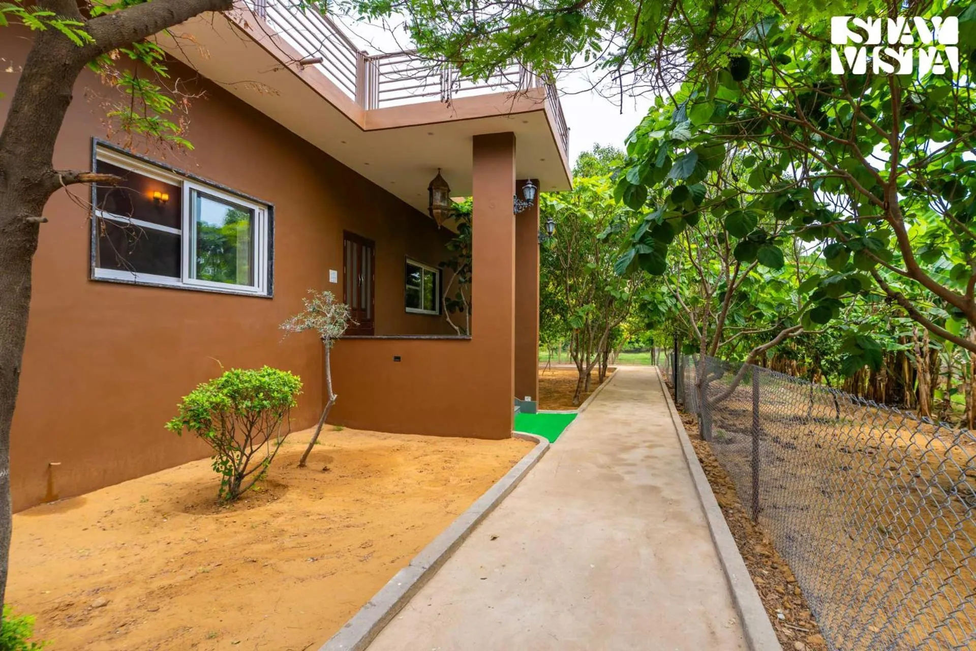 Property building in StayVista at Maple Farms with Pool, BBQ & Bonfire