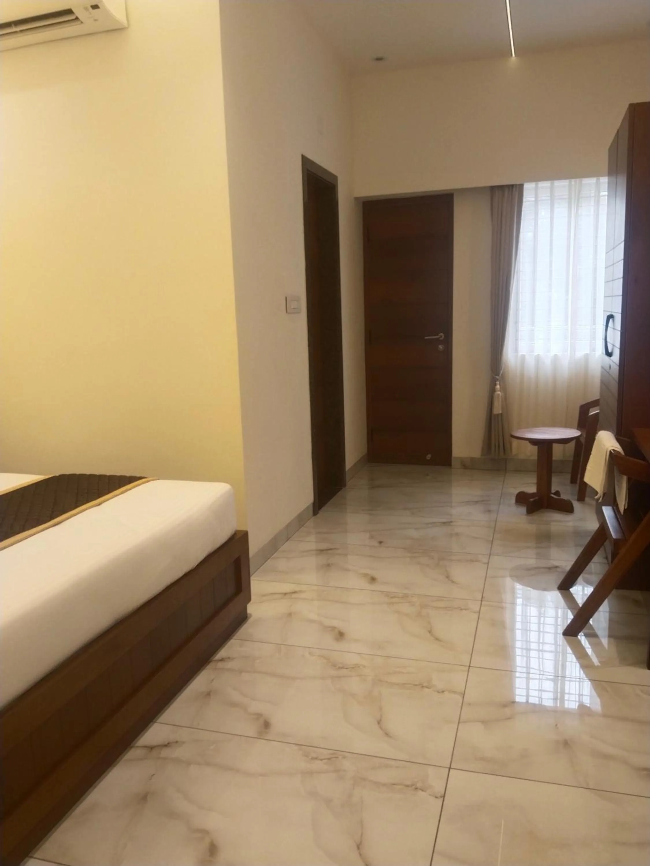 Bedroom, Bed in Parivar Residency