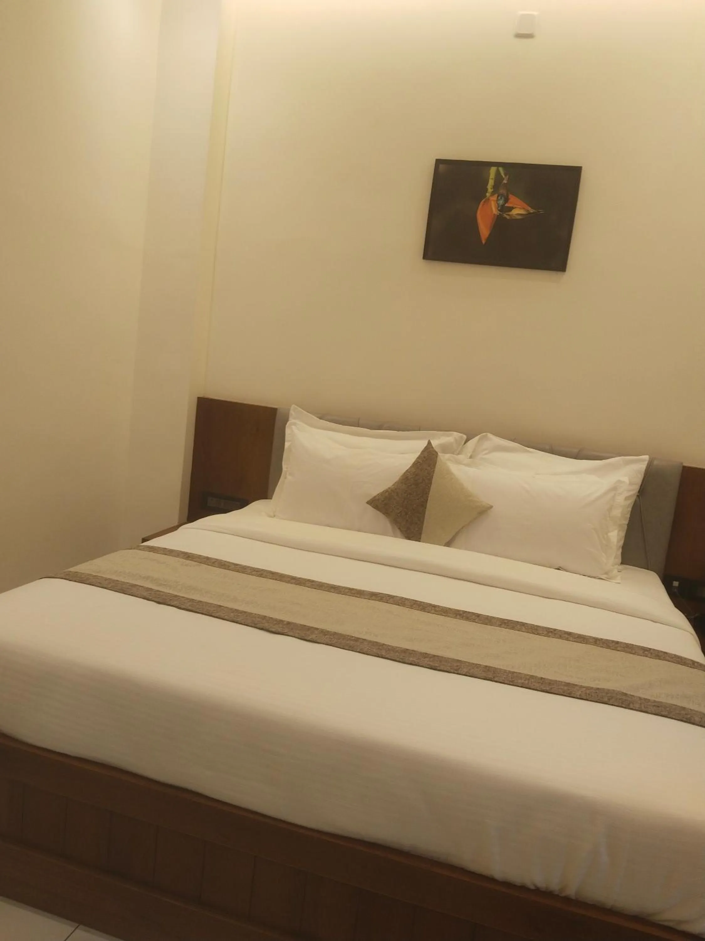 Photo of the whole room, Bed in Parivar Residency