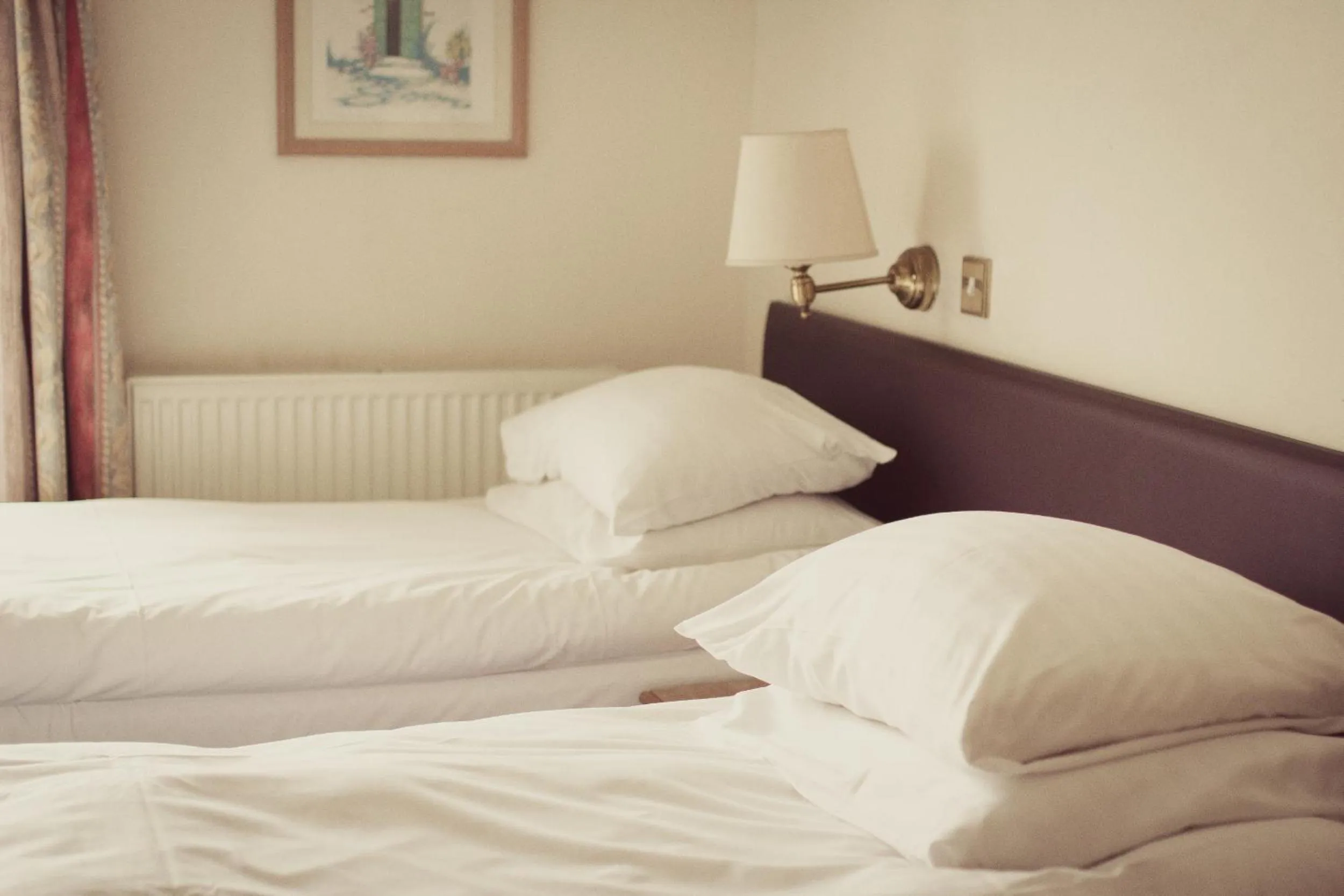 Bed in Abbey Lodge Hotel