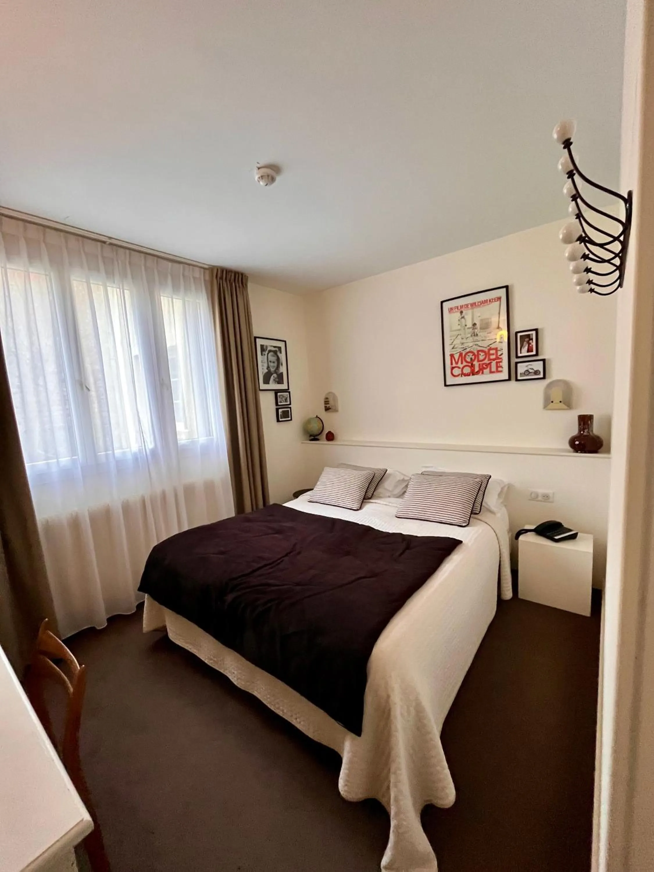 Bed in Le Téméraire Hôtel