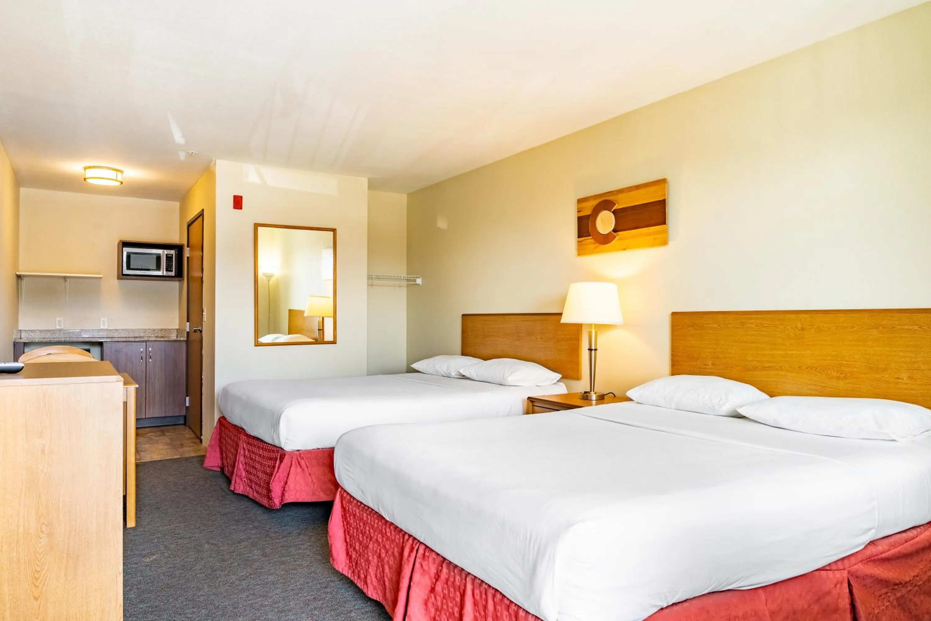 Photo of the whole room, Bed in City Inn