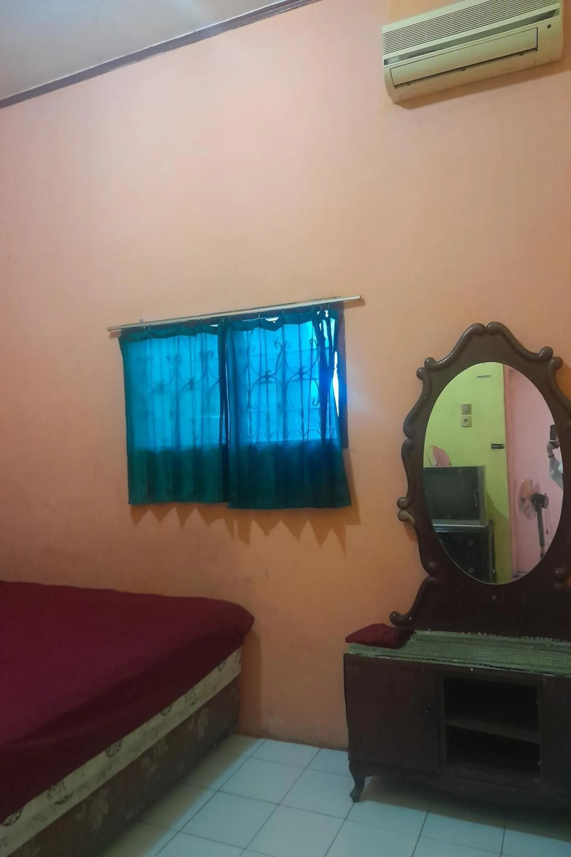 Bedroom in Hotel O Kamboja Homestay Syariah