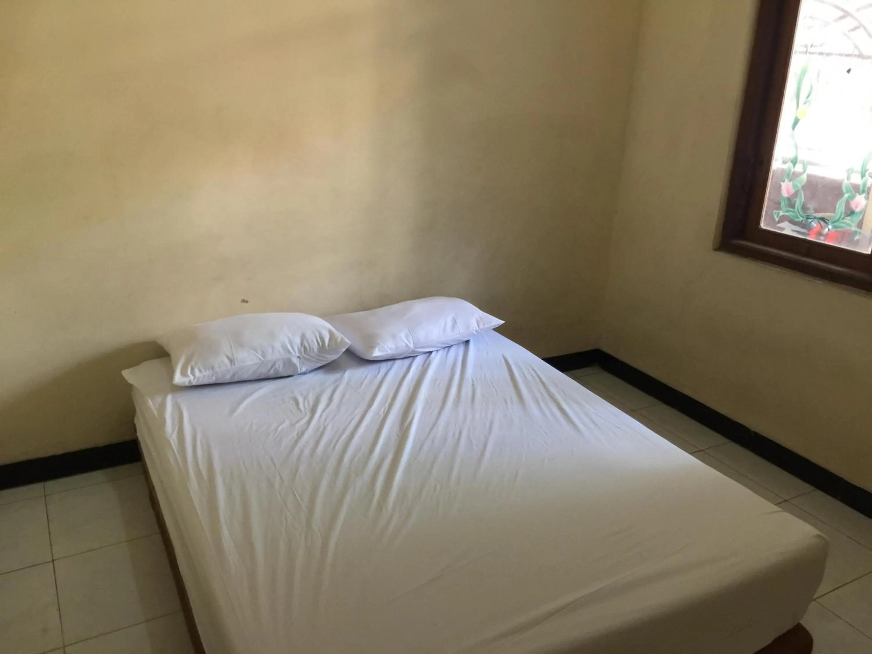 Bedroom, Bed in Hotel O Homestay Puri Indah SyariahNearBandara Internasional Juanda