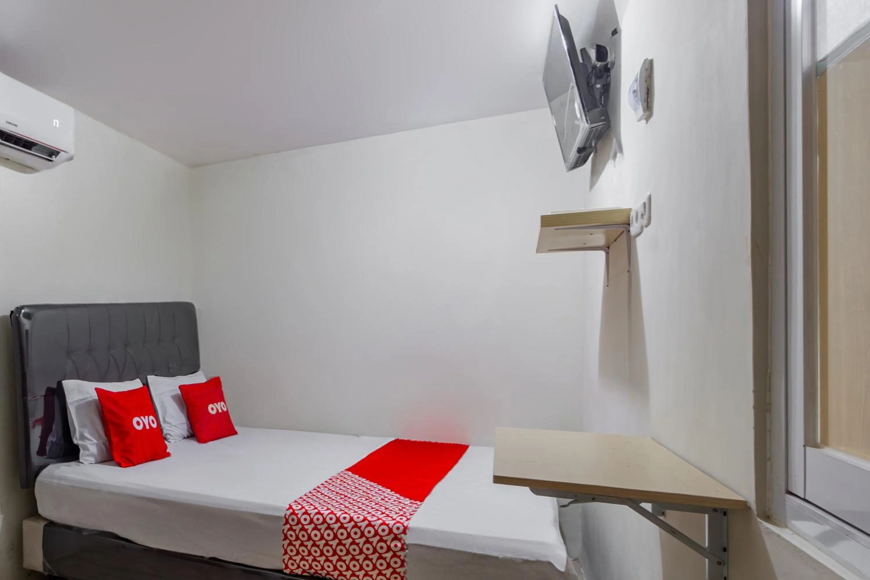 Bedroom in OYO 93526 Homely Syariah