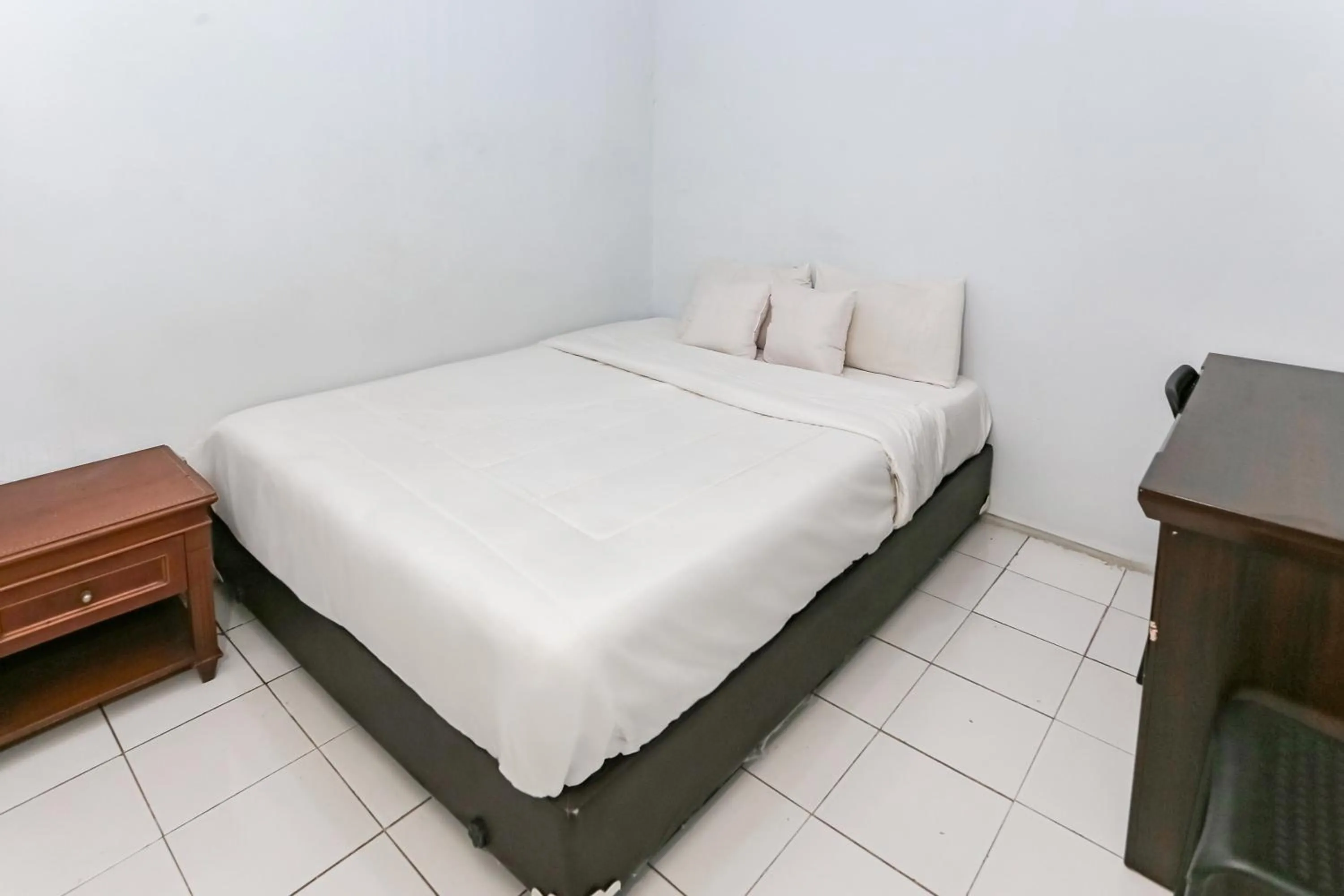 Bedroom in SPOT ON 93515 Pulo Gebang Guest House