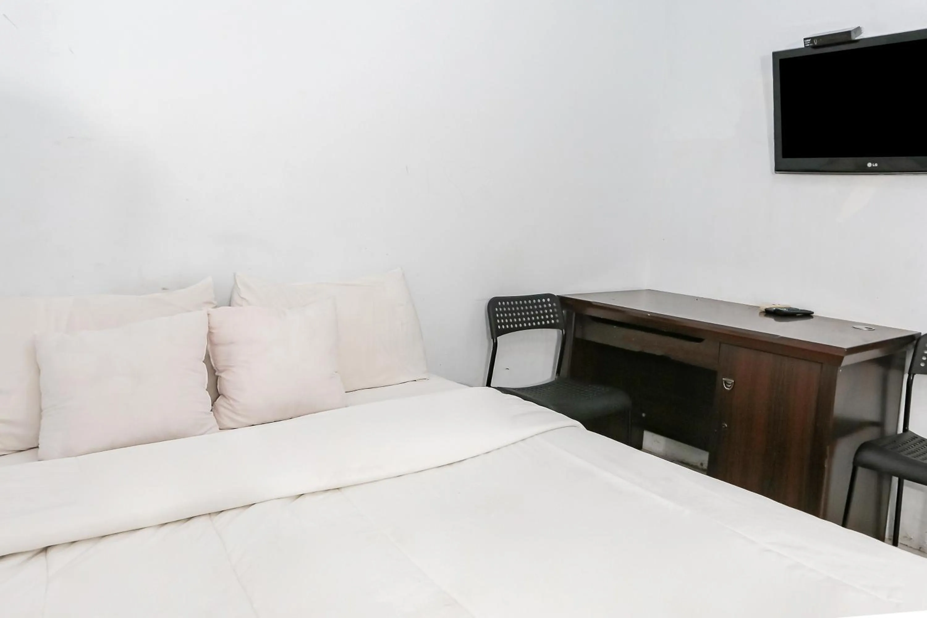 Bedroom in SPOT ON 93515 Pulo Gebang Guest House