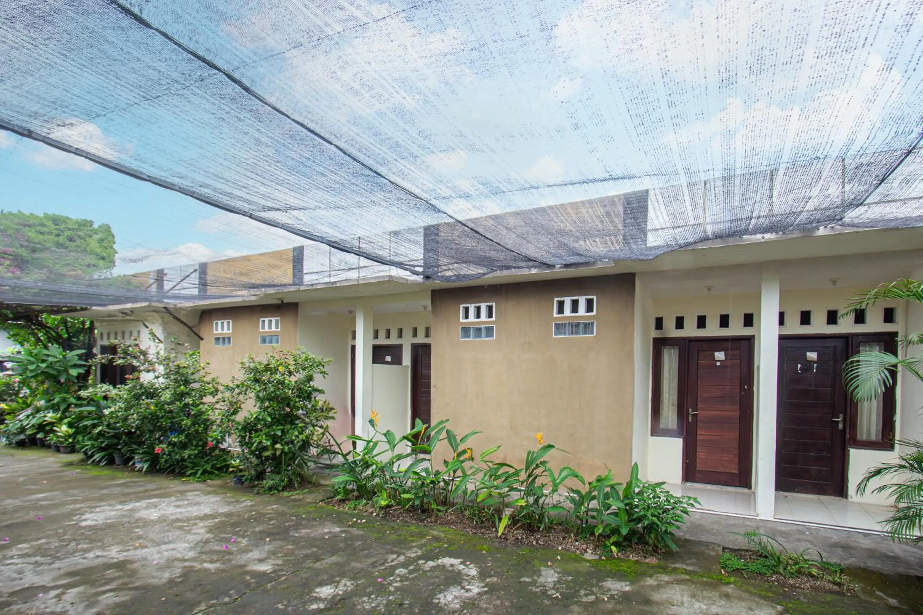 Facade/entrance in Hotel O Penginapan Melati Tanjung Near Kantor Pengamat Pengairan Tanjung