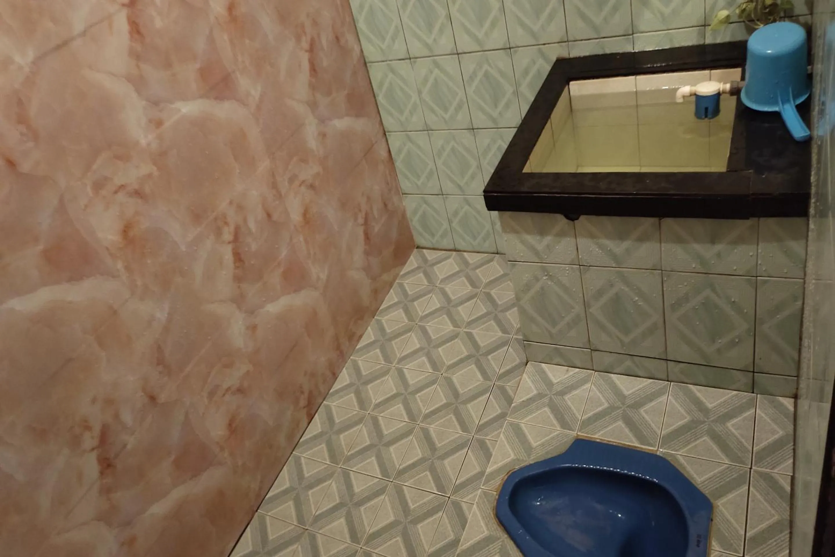 Bedroom in Hotel O Penginapan Laras PaminggirNearPesona Alam Seafood Pink Mira