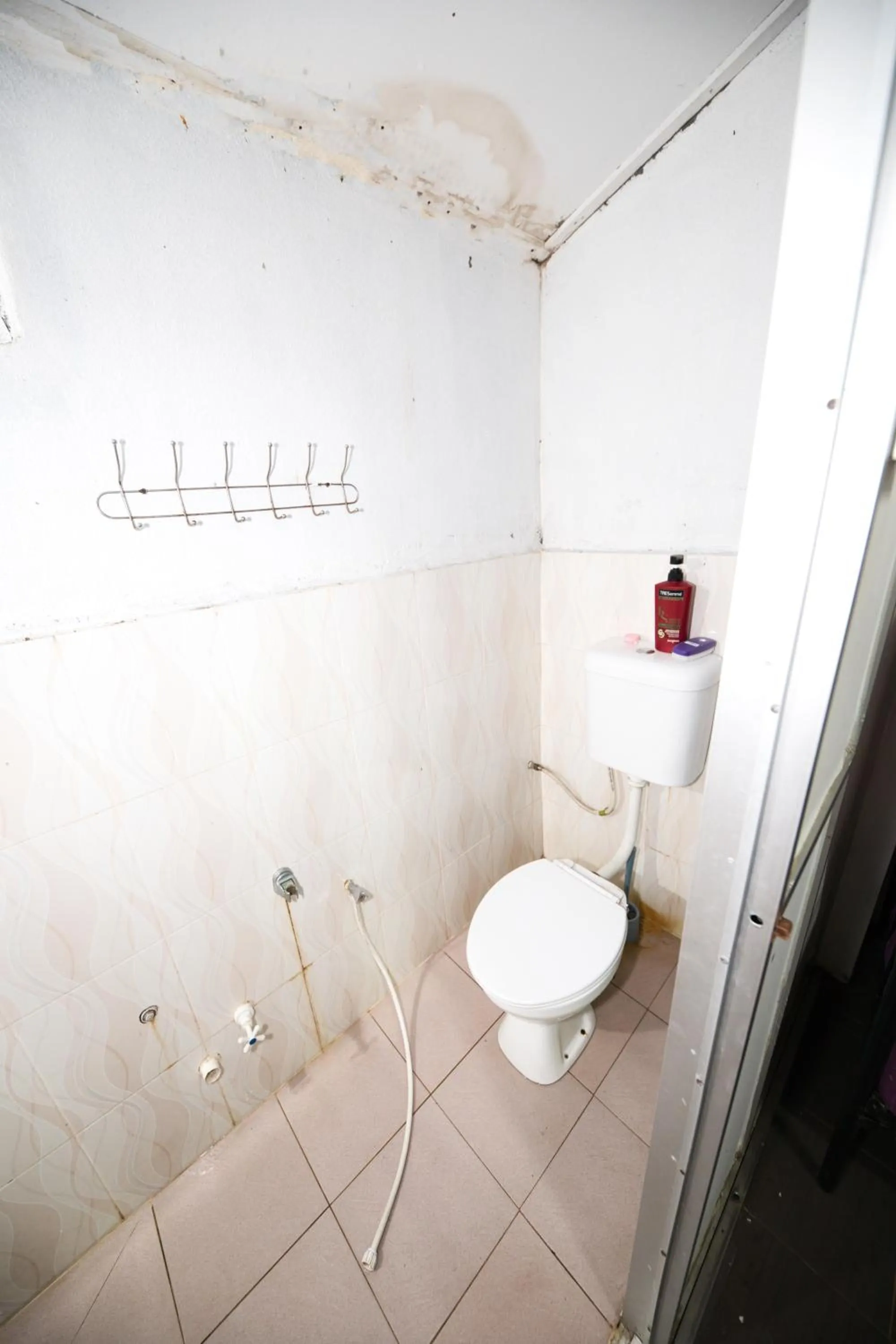 Bathroom in OYO 90915 Ilham Villa