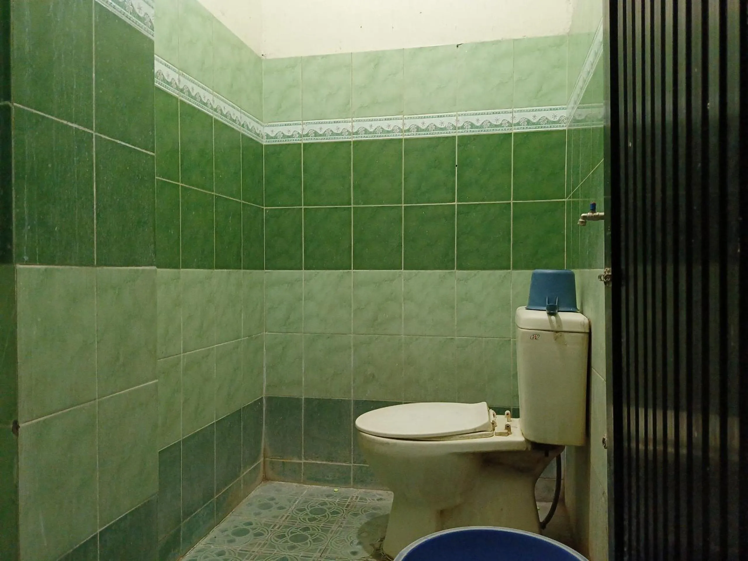 Bathroom in Hotel O Millow Kost Near Gedung Rektorat IAIN PAREPARE