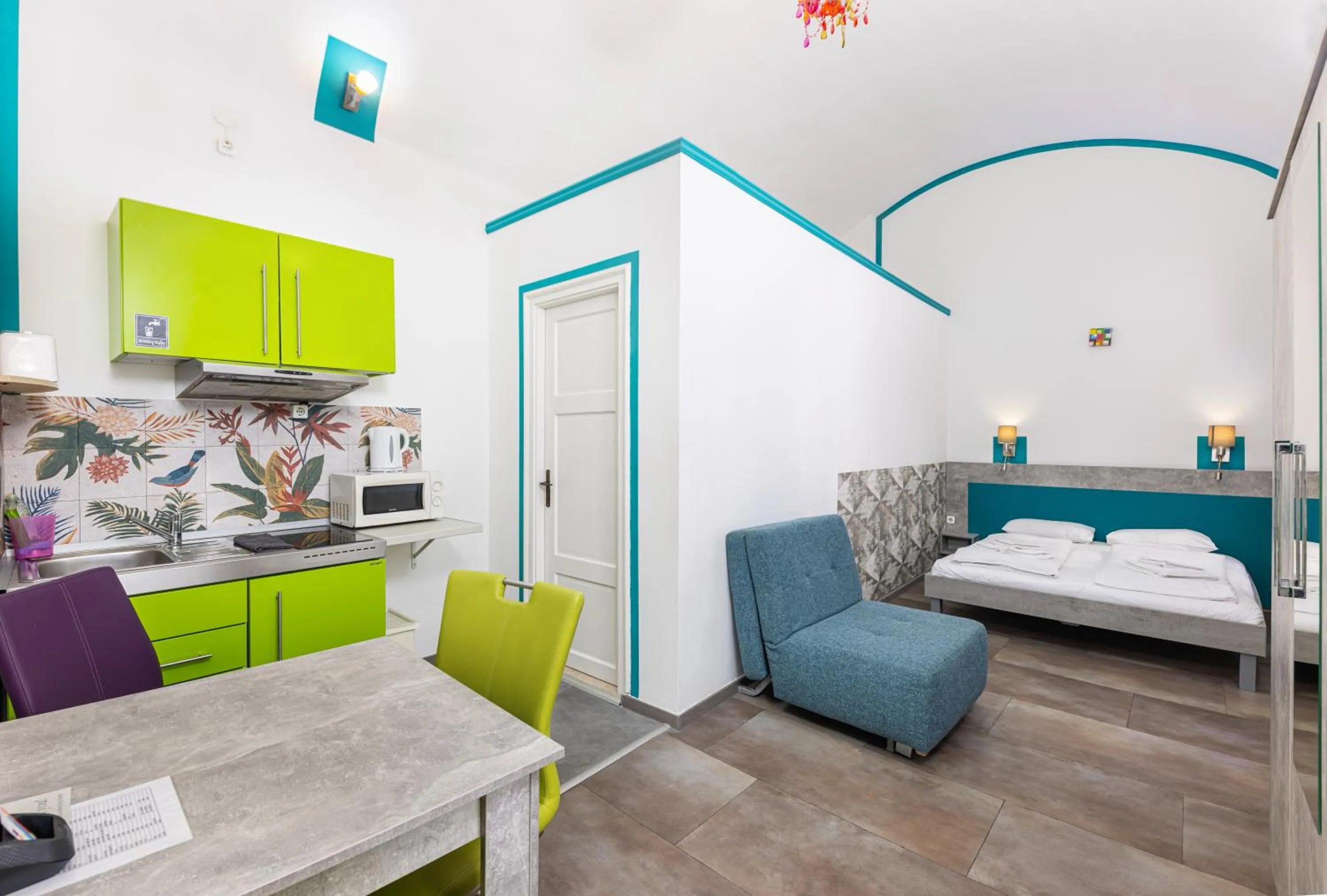 Bed in Amber Gardenview Studios Downtown