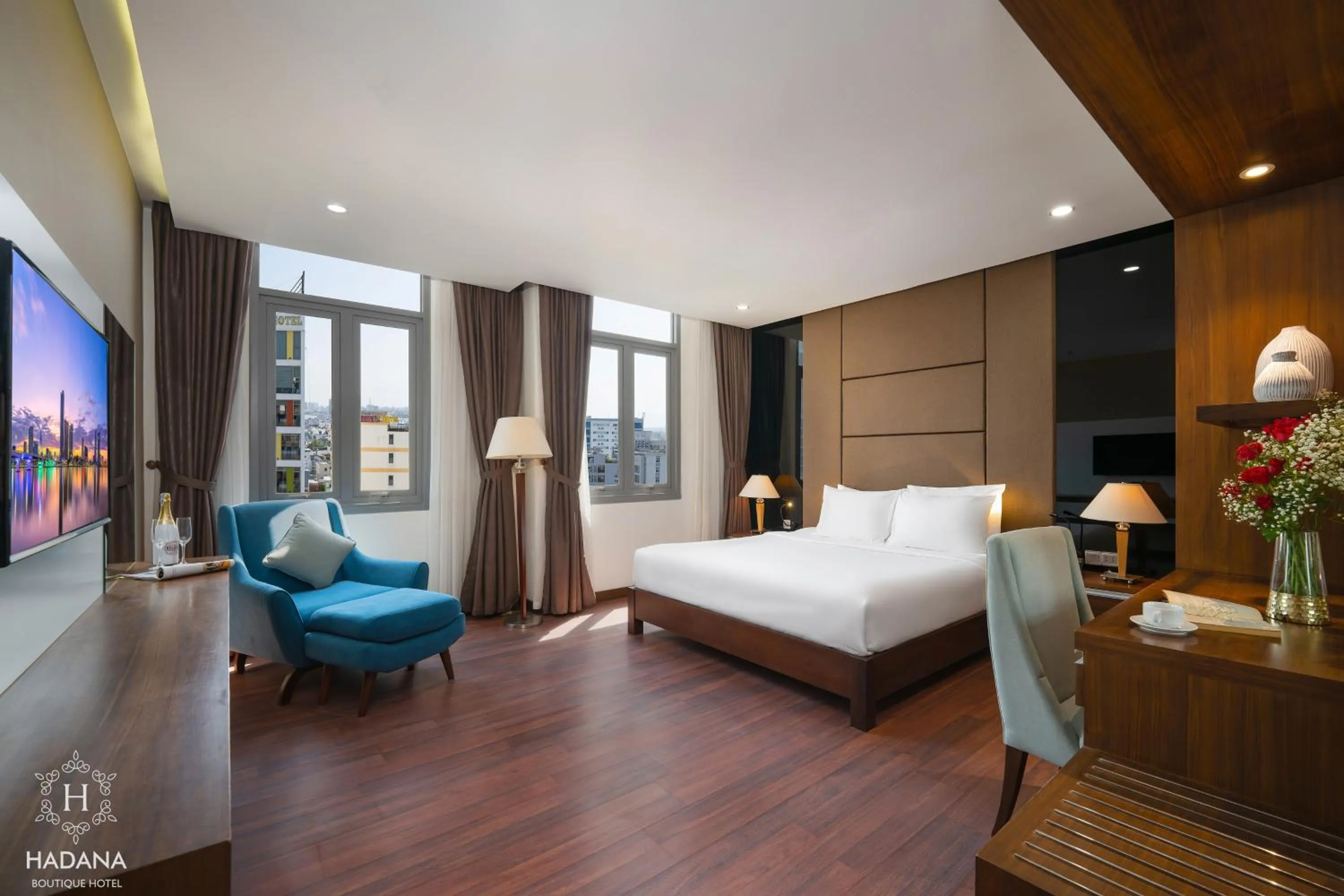 Communal lounge/ TV room, Bed in Hadana Boutique Hotel Danang