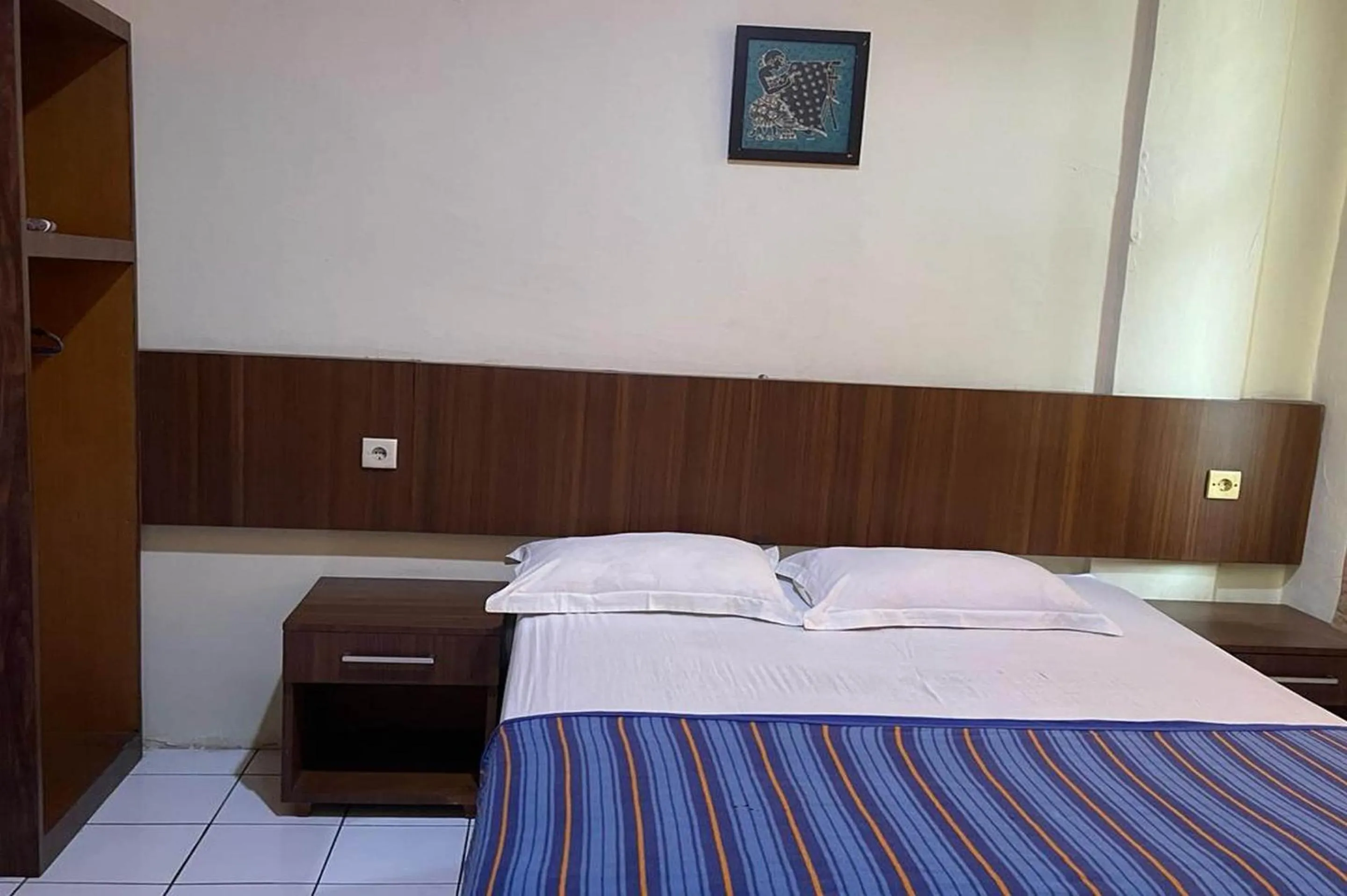 Bedroom, Bed in Hotel O Homestay Pakmuklis Syariah 2 Near Taman Mini Lhokseumawe