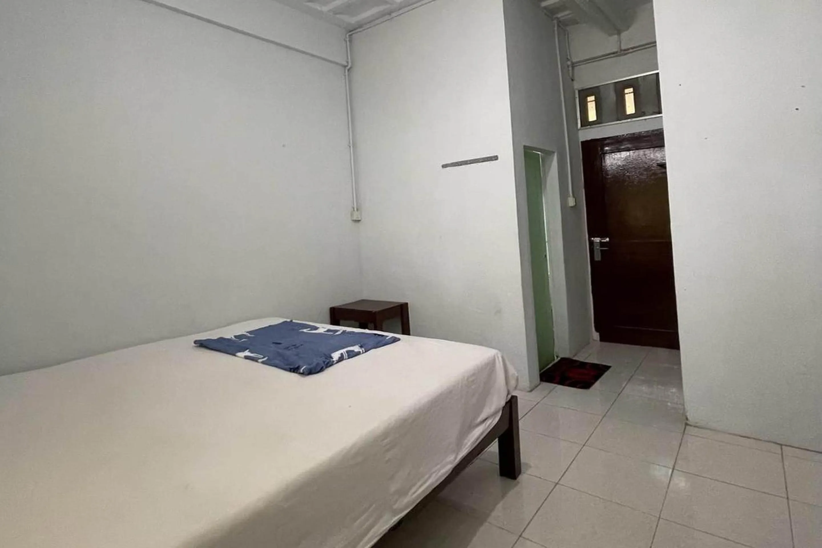 Bedroom in Hotel O Saril Riverside HomestayNearLapangan Musara Alun