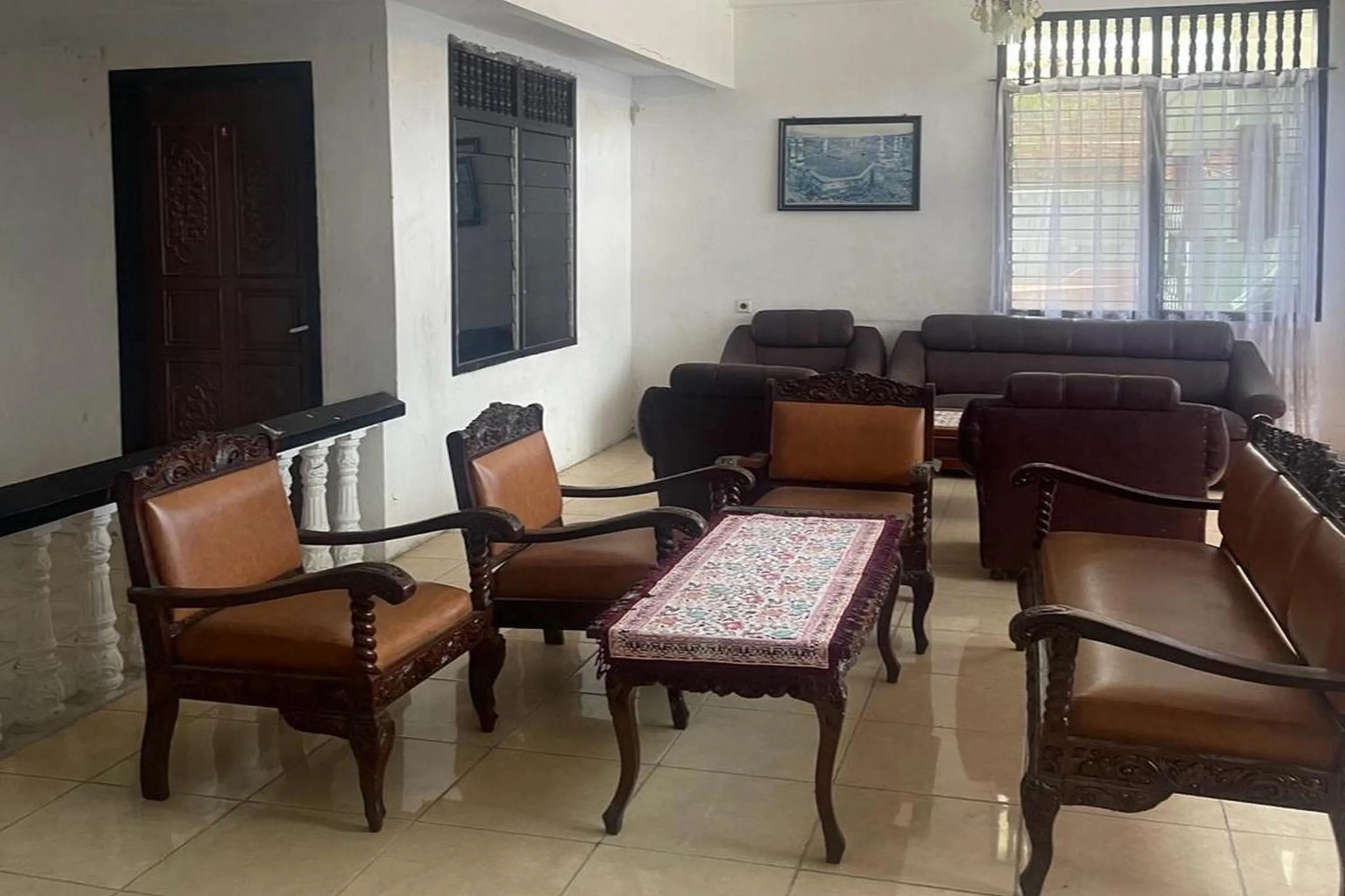Lobby or reception in Hotel O Saril Riverside HomestayNearLapangan Musara Alun