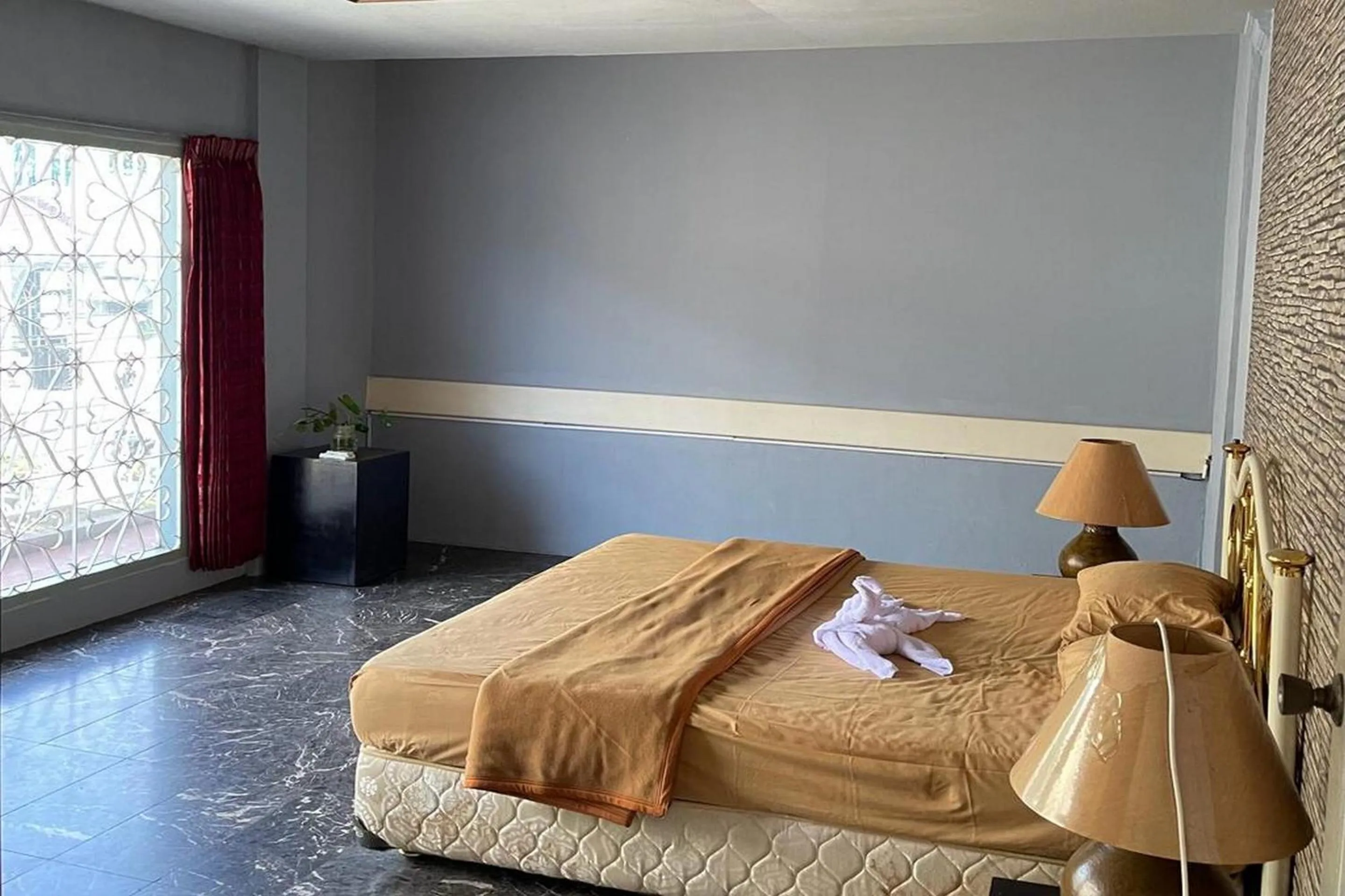 Bedroom in Hotel O Saril Riverside HomestayNearLapangan Musara Alun