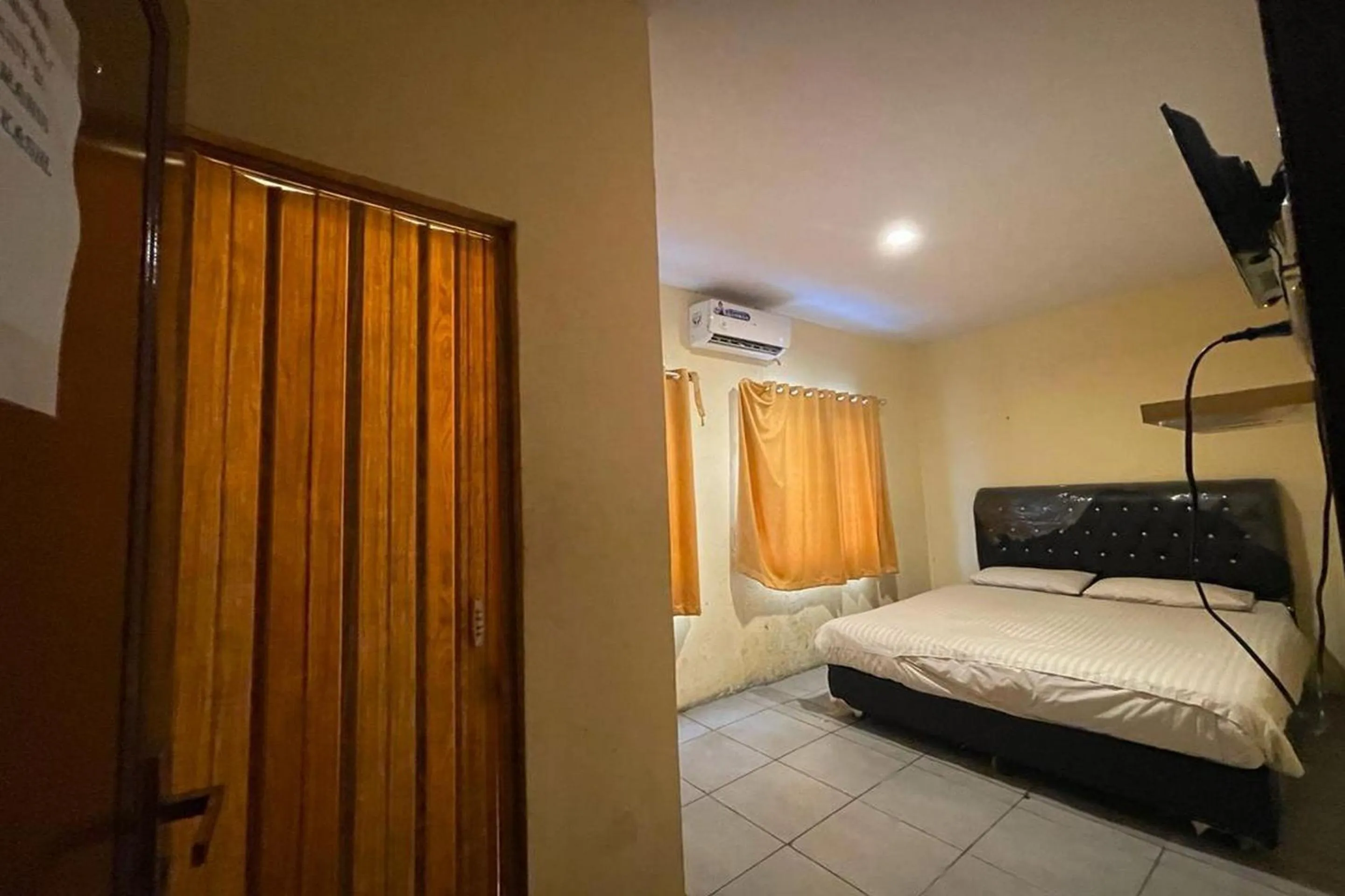 Bedroom in Hotel O Saril Riverside HomestayNearLapangan Musara Alun