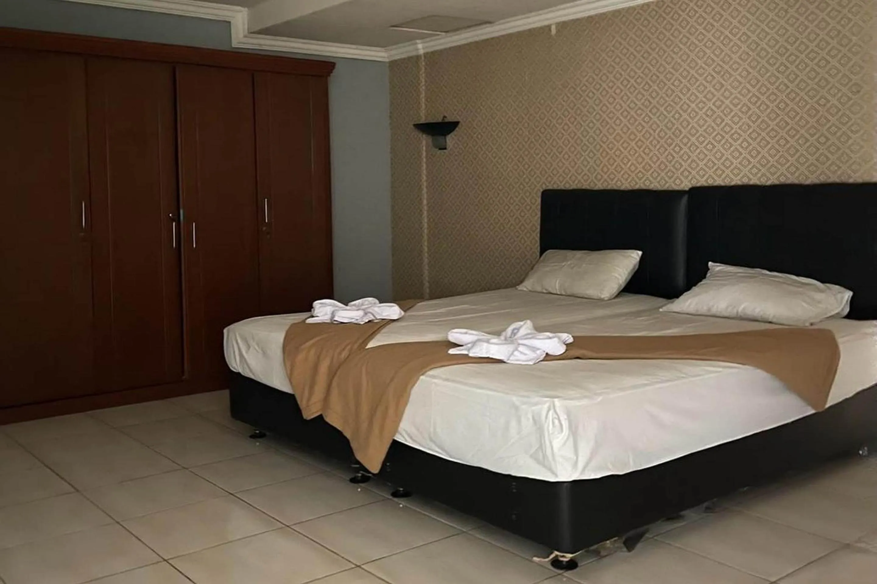 Bedroom in Hotel O Saril Riverside HomestayNearLapangan Musara Alun