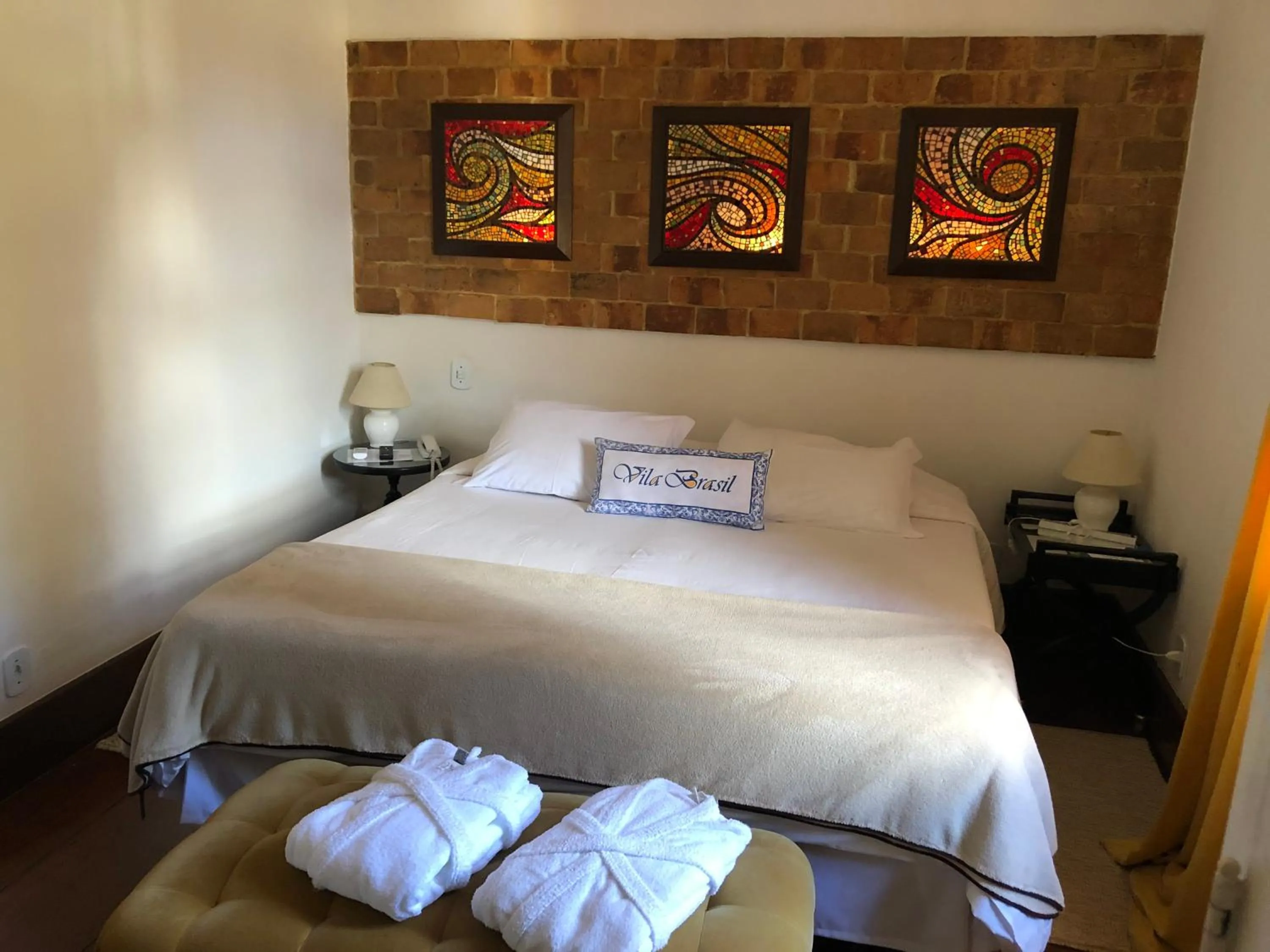 Bed in Pousada Vila Brasil