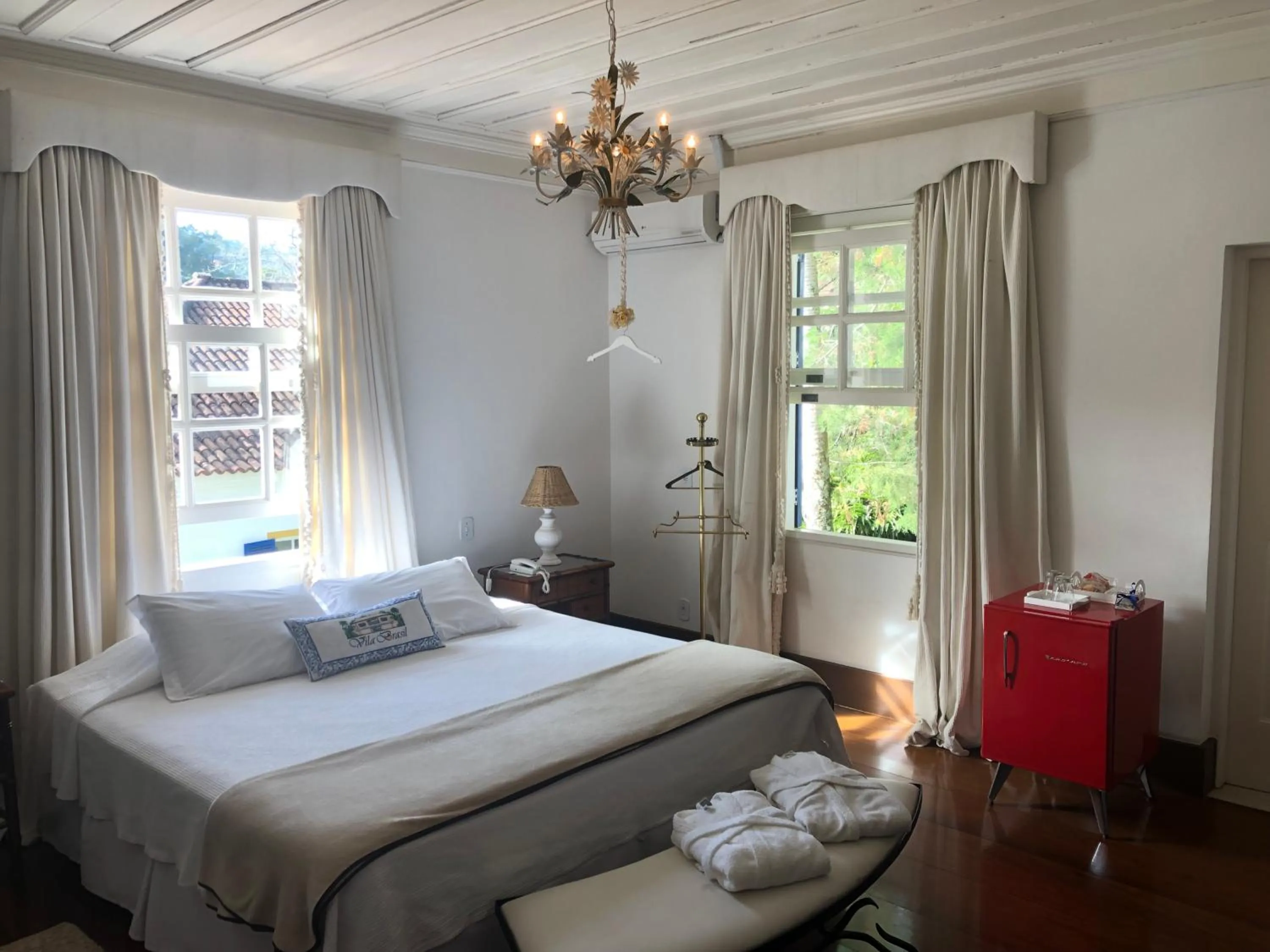 Bed in Pousada Vila Brasil