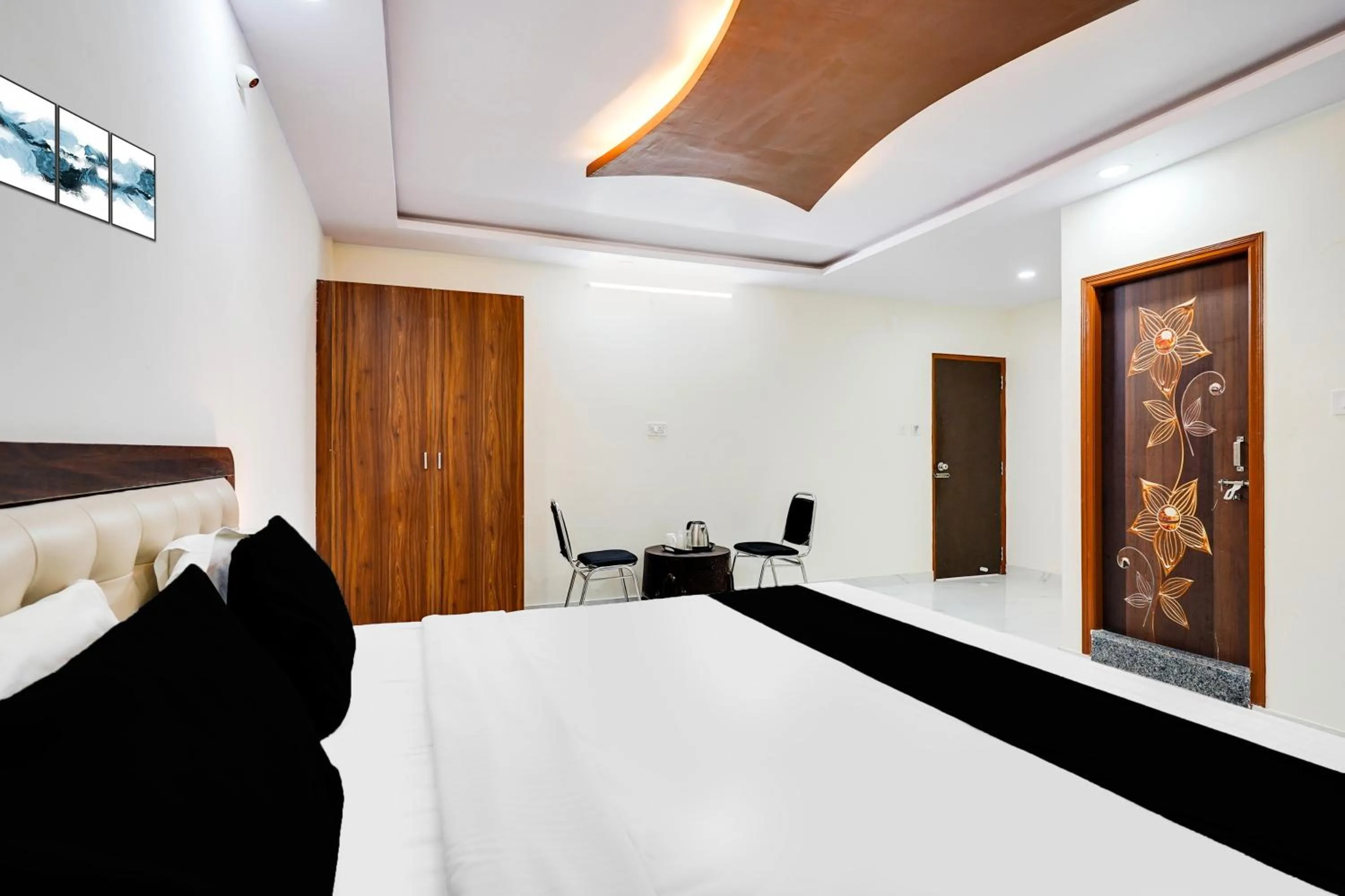 Bedroom in Super Townhouse Bidadi Formerly Royal Garuda