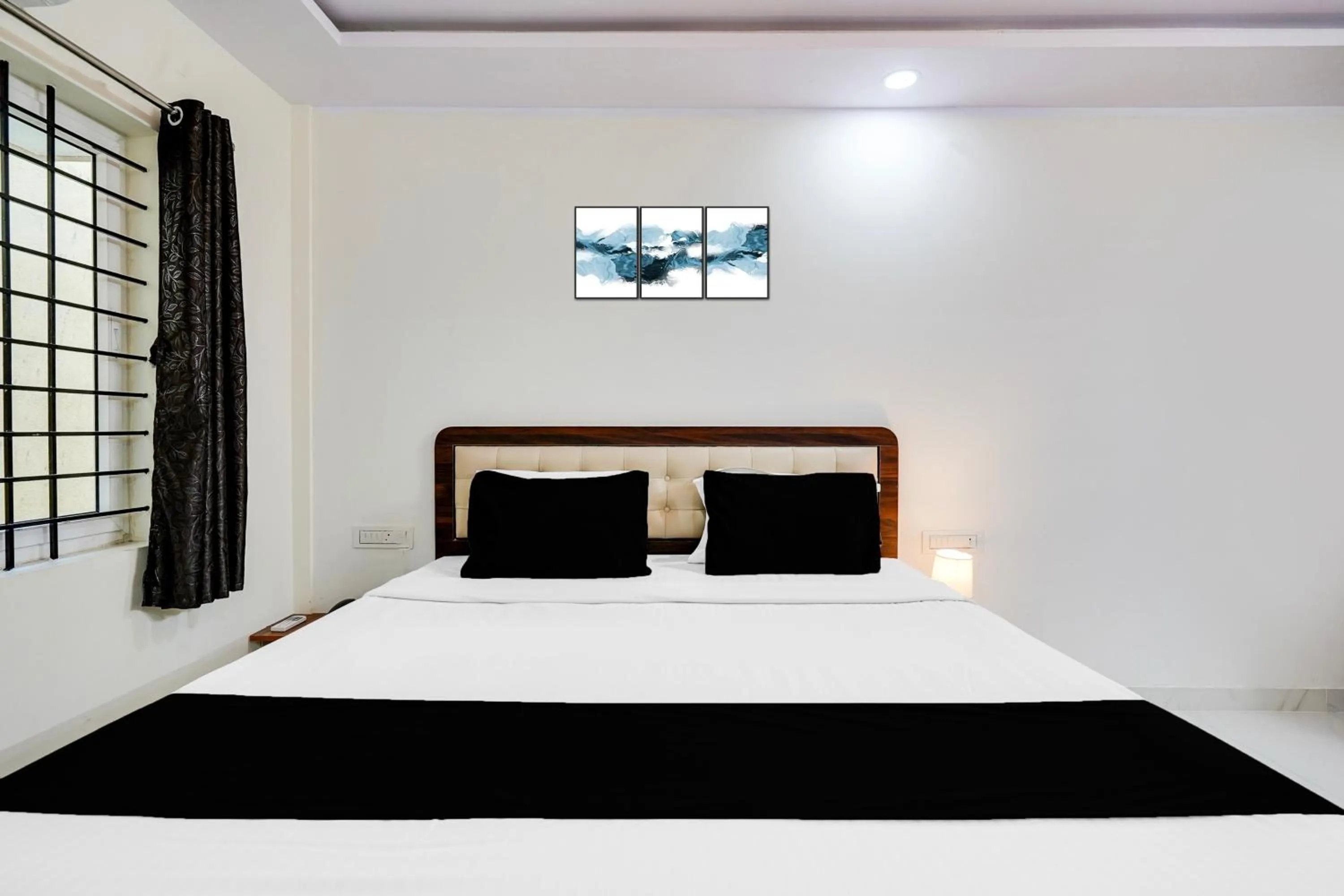 Bedroom in Super Townhouse Bidadi Formerly Royal Garuda