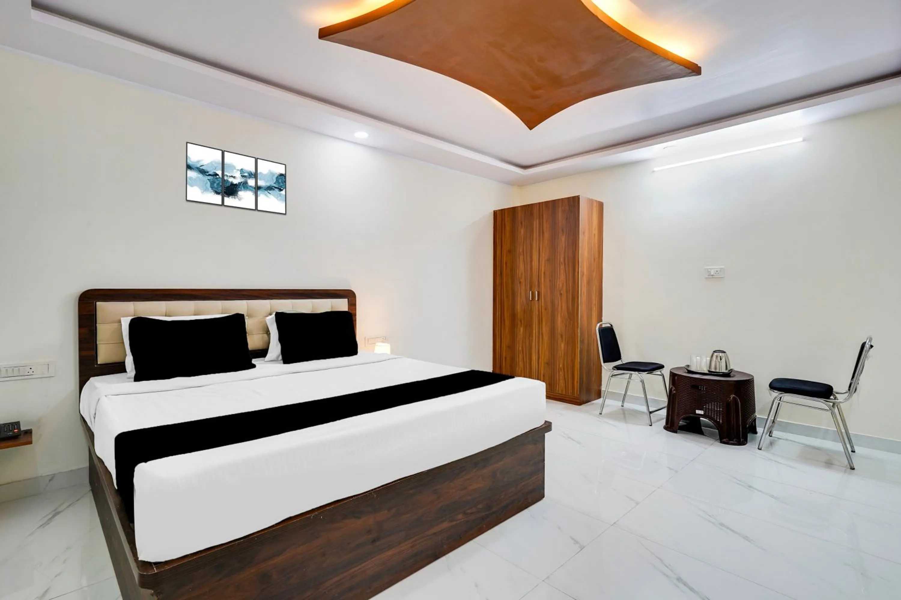 Bedroom in Super Townhouse Bidadi Formerly Royal Garuda