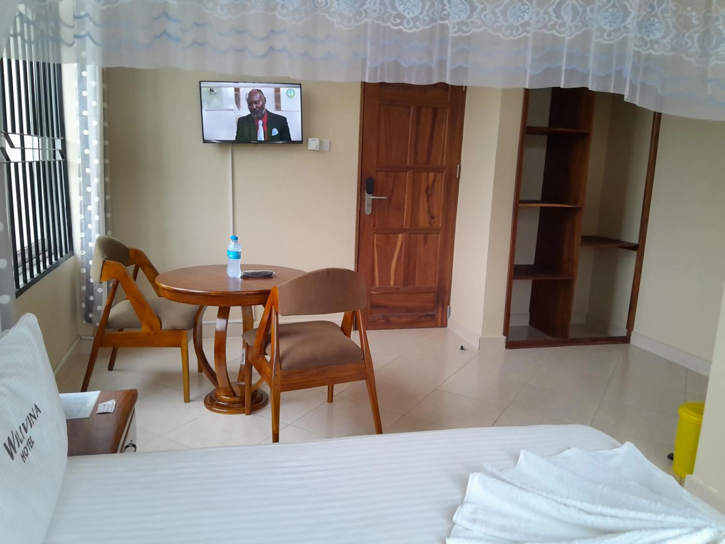 Dining area, Bed in WILIVINA HOTEL