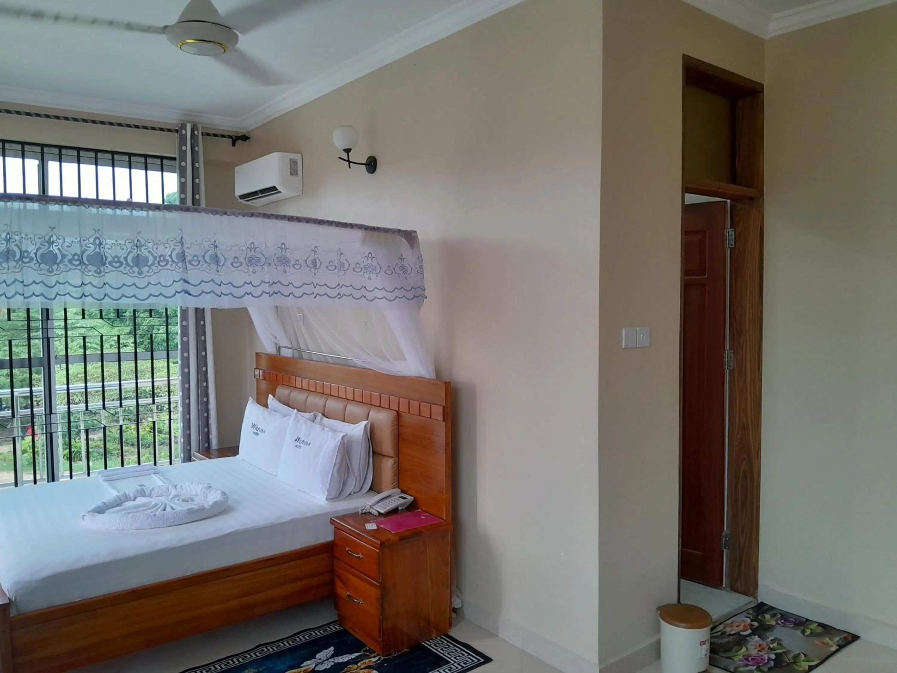 Bed in WILIVINA HOTEL