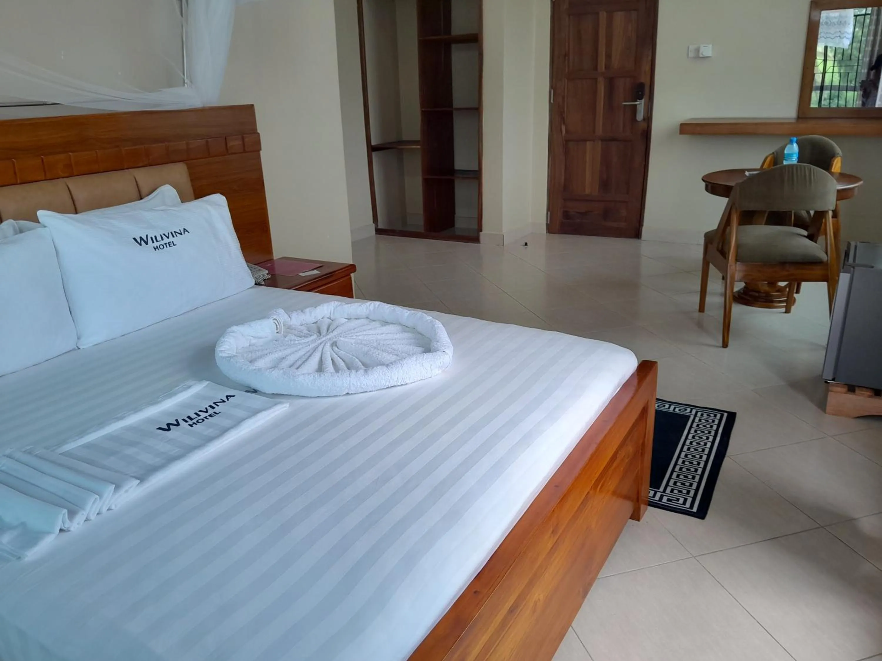 Bed in WILIVINA HOTEL