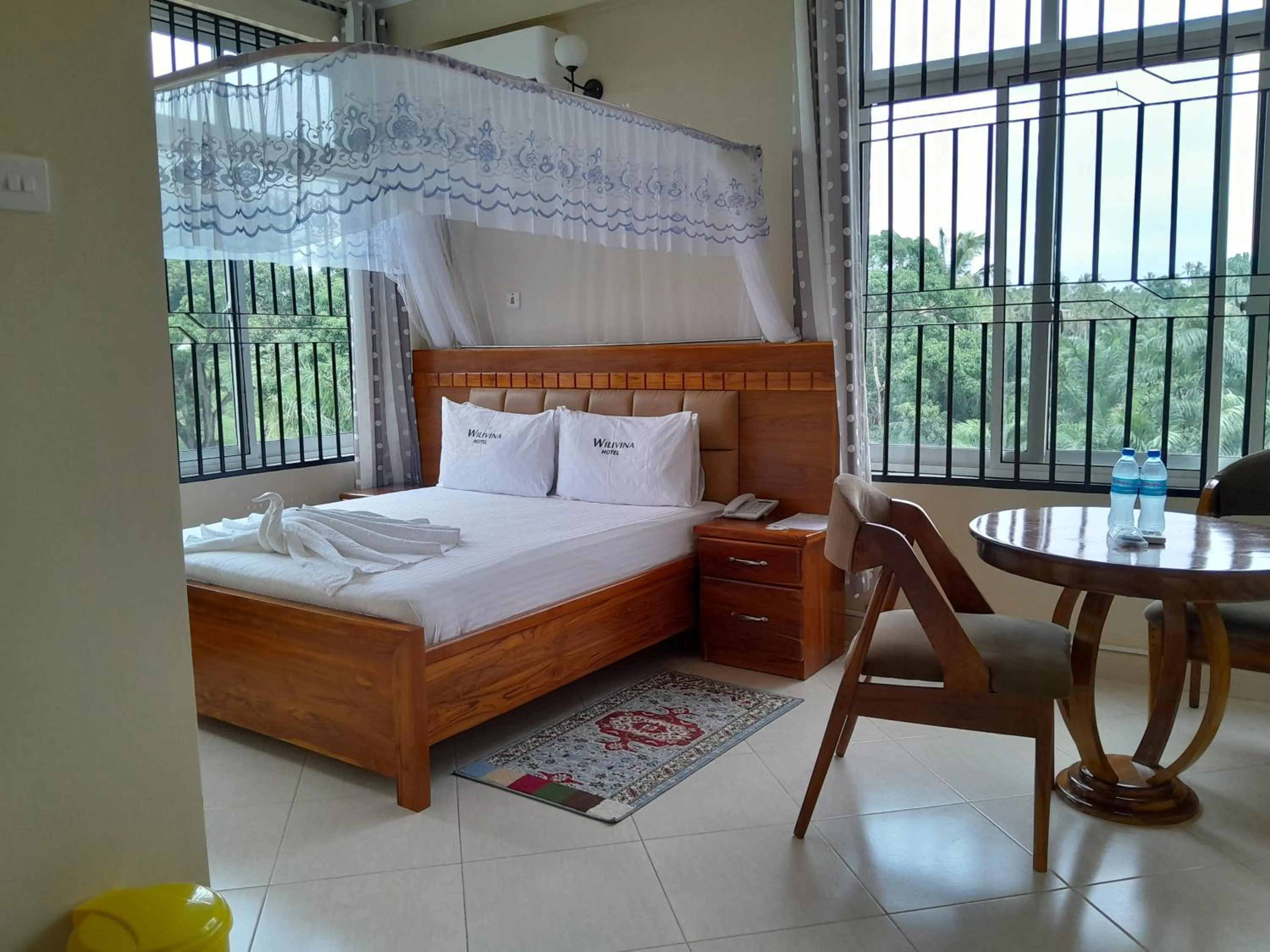 Bed in WILIVINA HOTEL