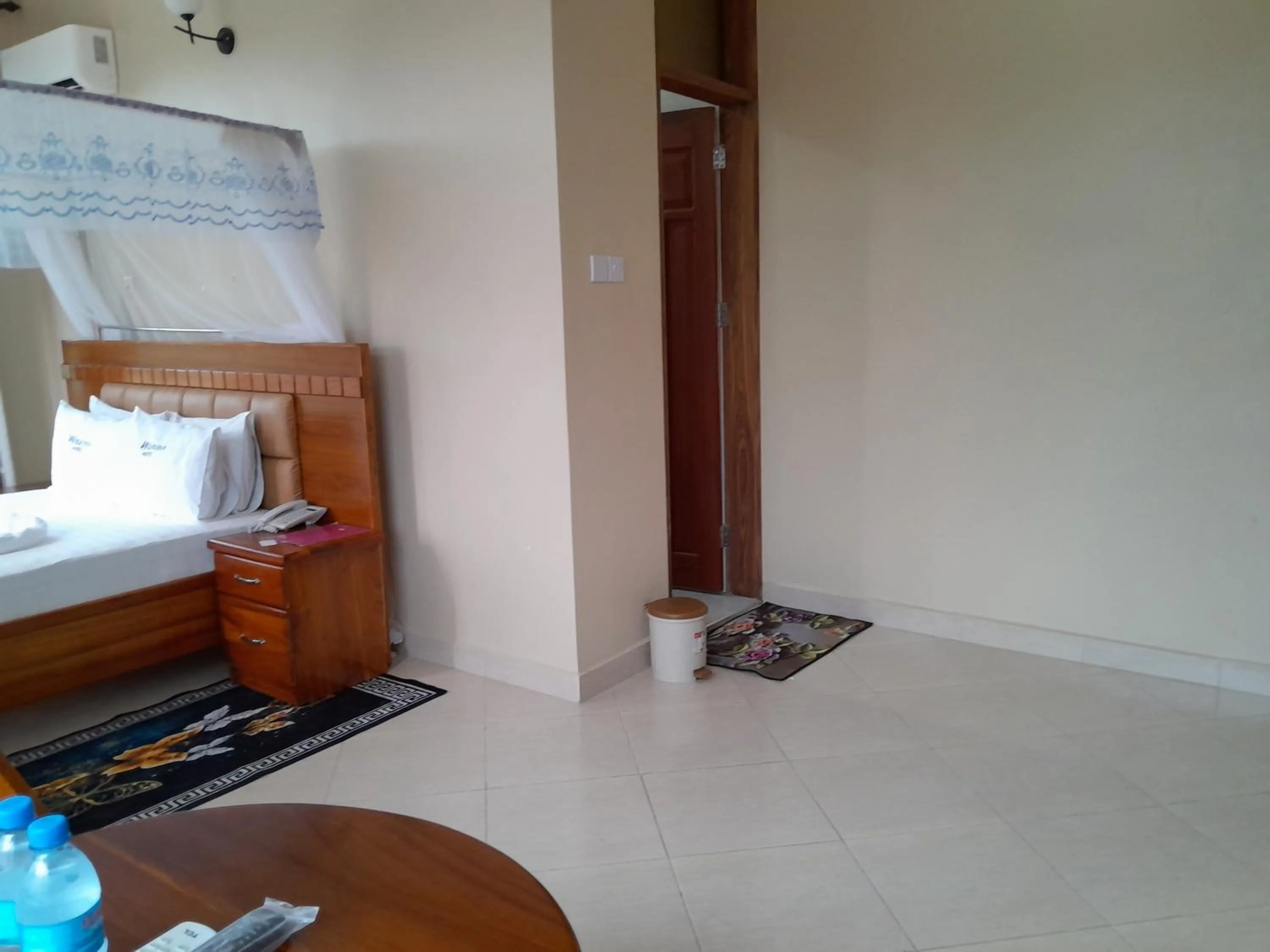 Bed in WILIVINA HOTEL