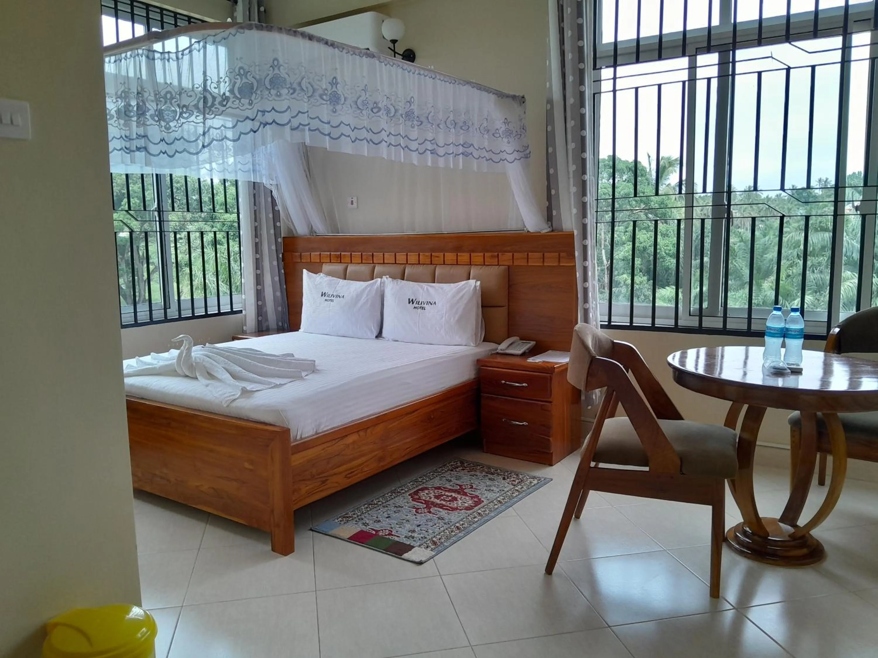 Dining area, Bed in WILIVINA HOTEL