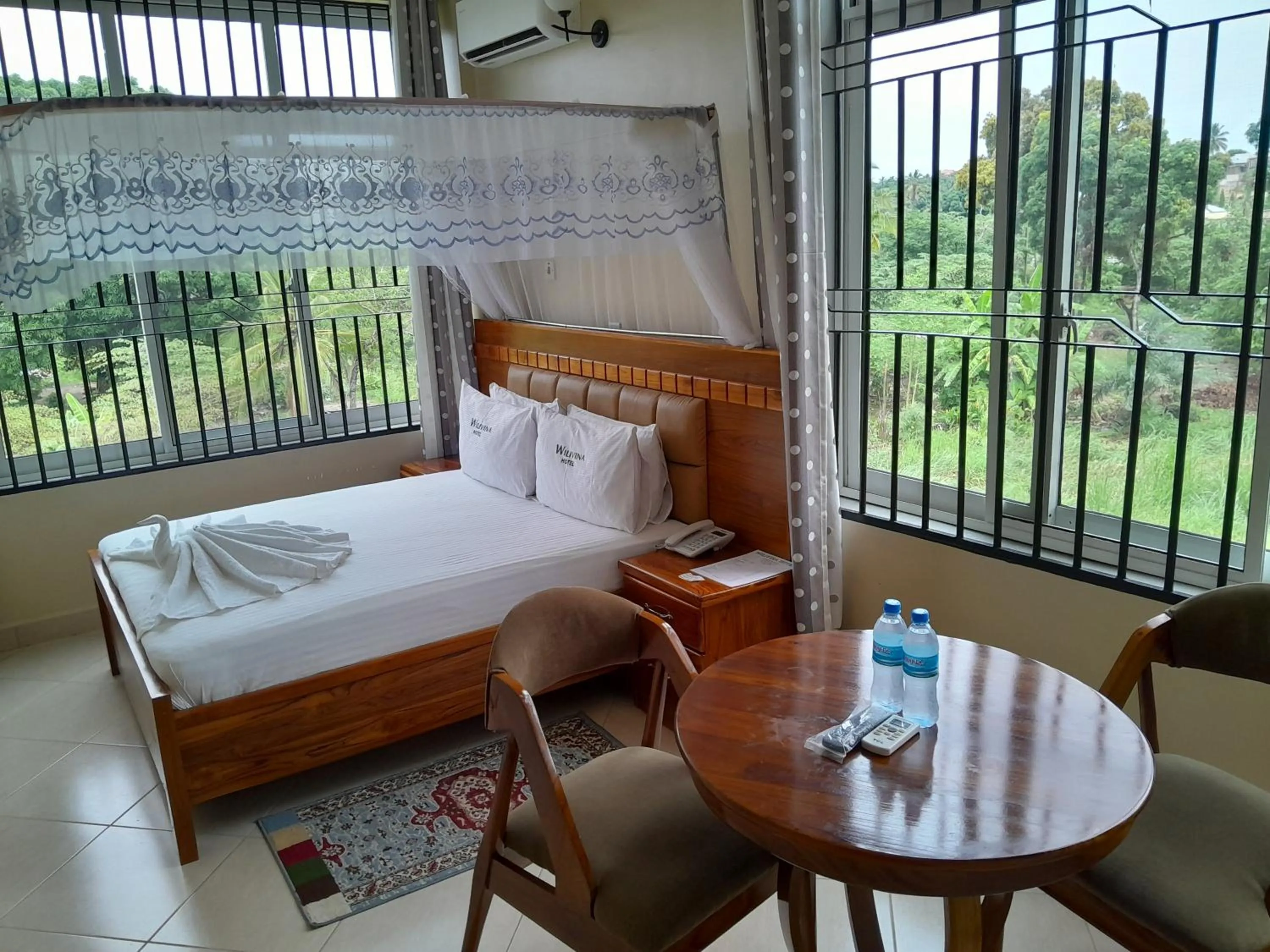 View (from property/room), Bed in WILIVINA HOTEL