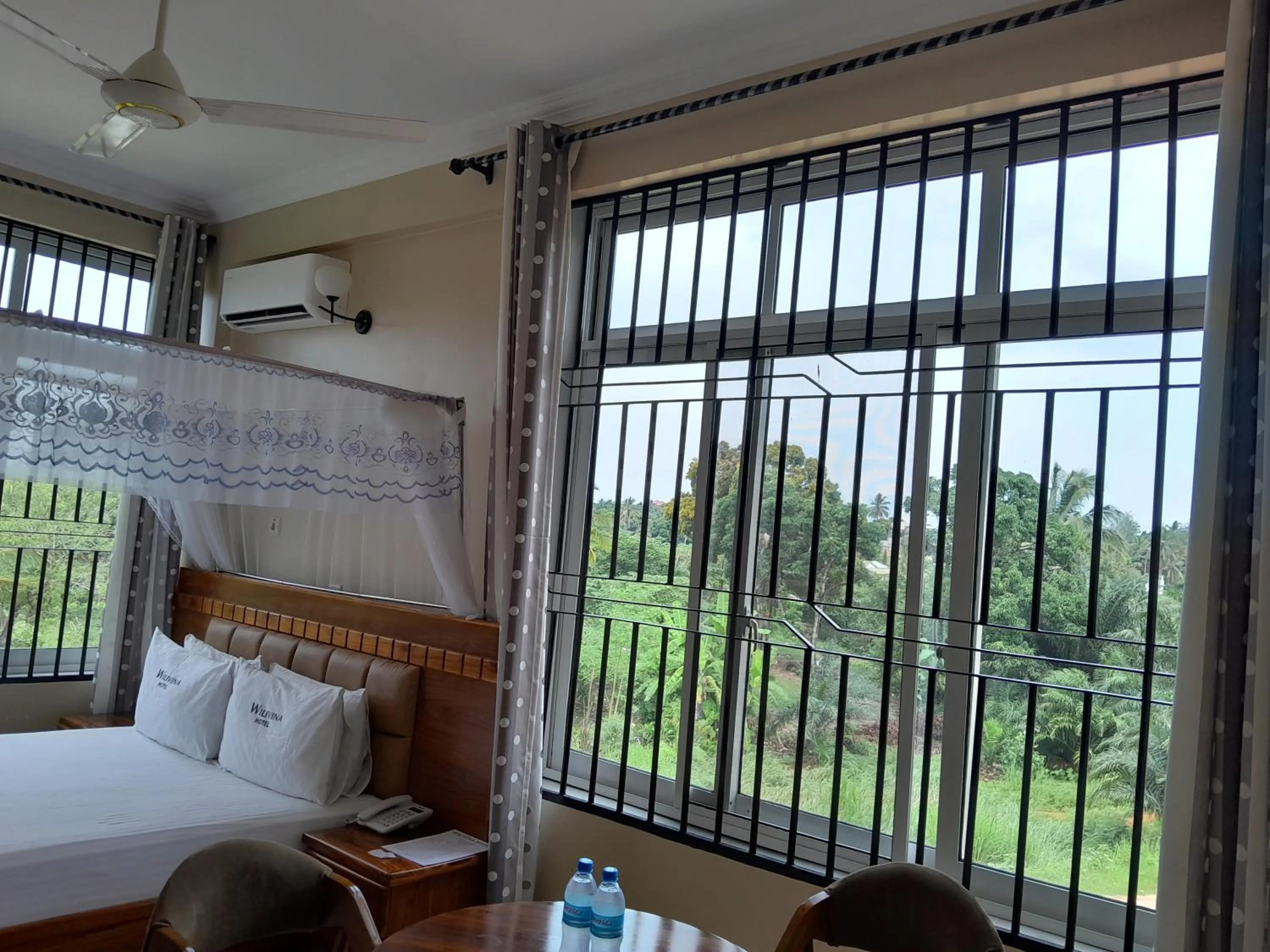 Bed in WILIVINA HOTEL