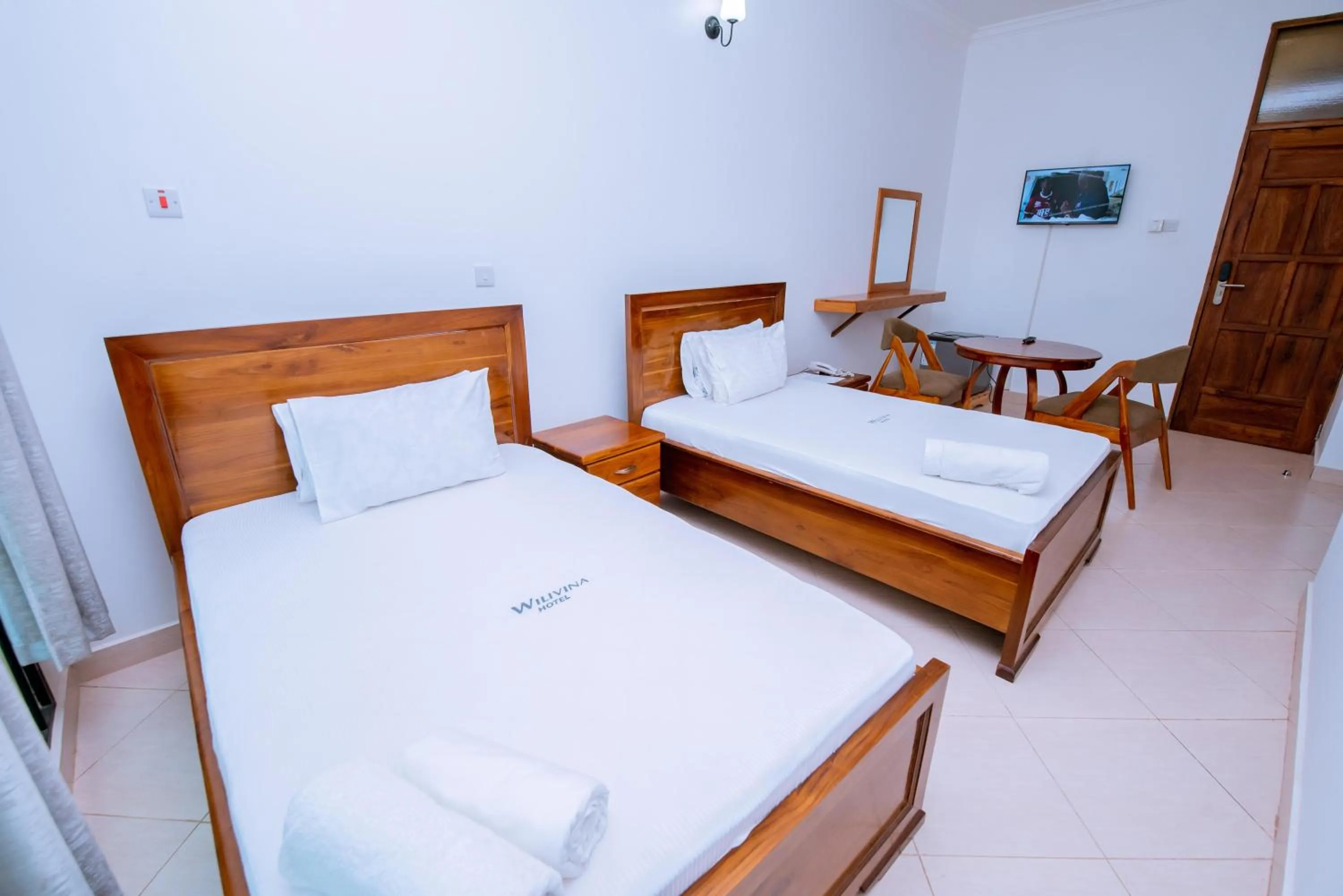 Bed in WILIVINA HOTEL