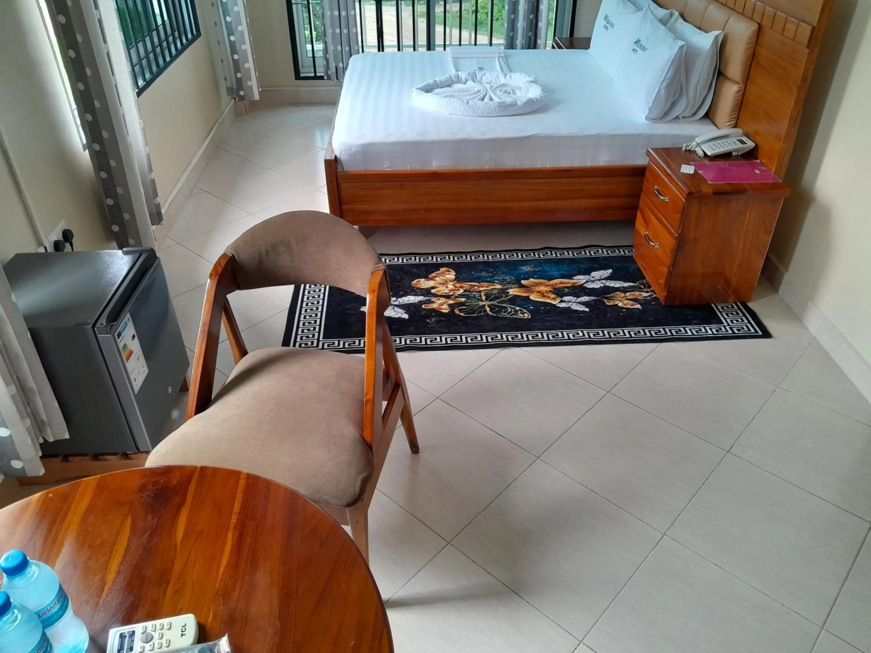 Seating area, Bed in WILIVINA HOTEL